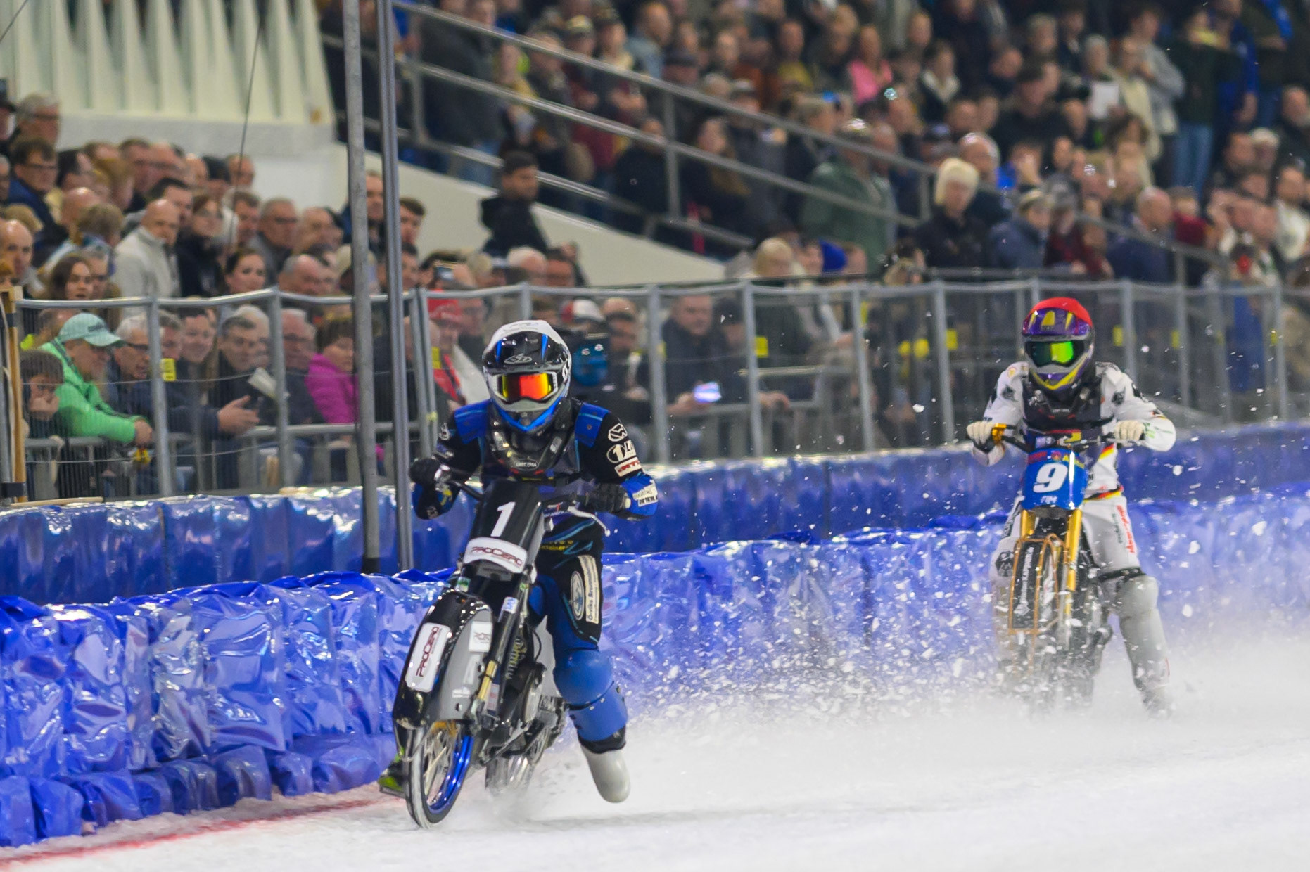 Niclas Svensson (1) of Sweden  in White leading Max Niedermaier (9) of Germany  during the FIM Ice Speedway Of Nations at Ice Rink Thialf, Heerenveen on Sunday 12th April 2026. (Photo: Ian Charles | MI News)