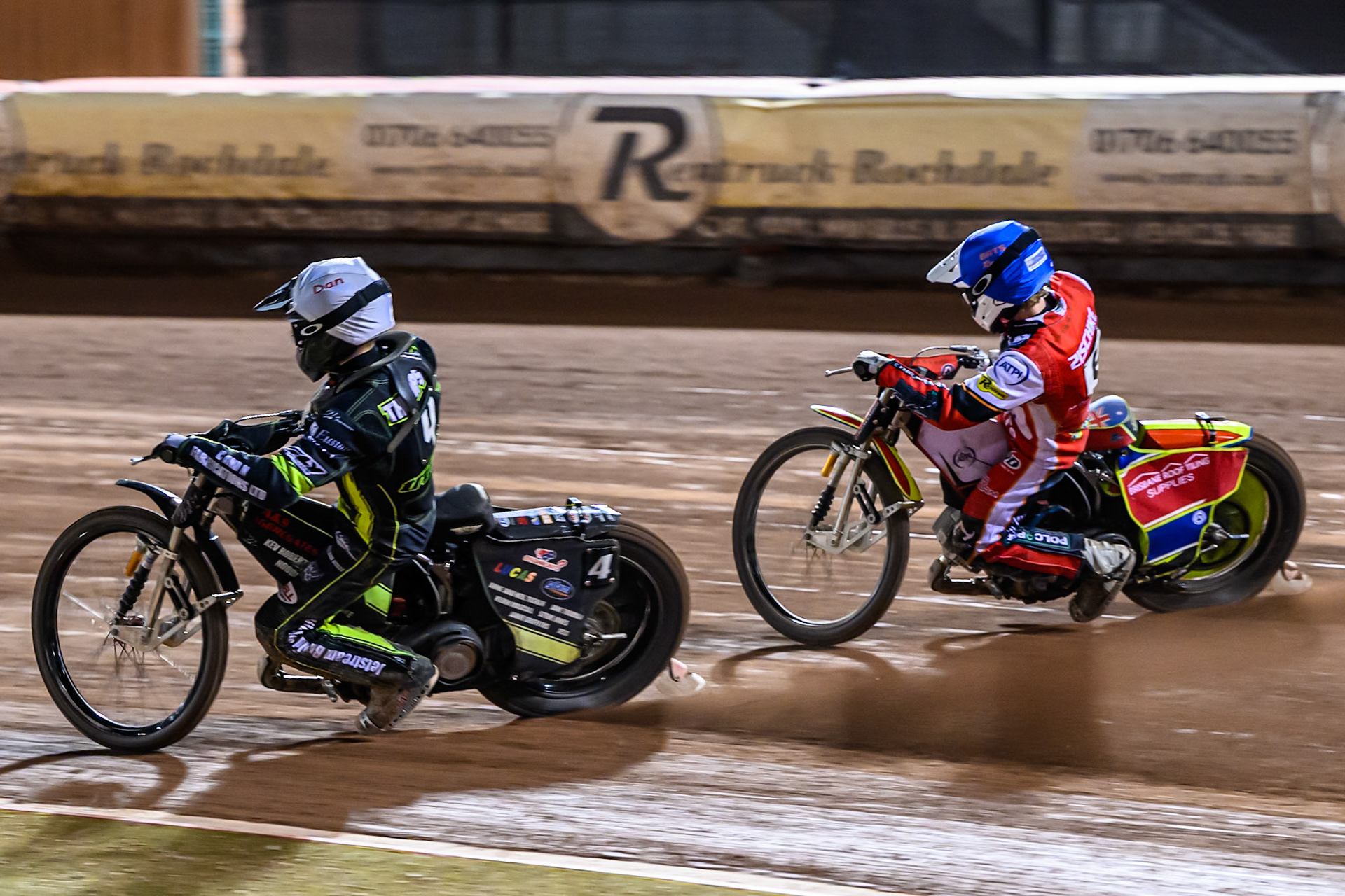 Dan Thompson of Ipswich Witches  in White leading Tate Zischke of Belle Vue Aces  in Blue during the Rowe Motor Oil Premiership Play Off Semi Final 1 (1st Leg)  between Belle Vue Aces and Ipswich Witches at the National Speedway Stadium, Manchester on Monday 8th September 2025. (Photo: Ian Charles | MI News)