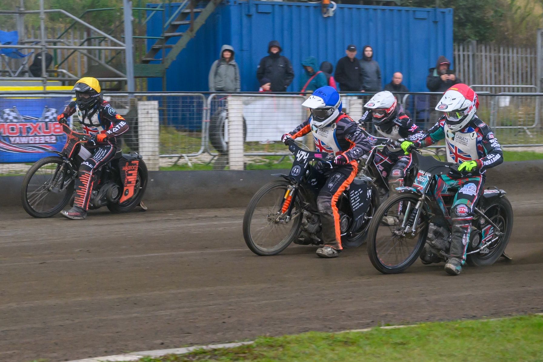 SEMI FINAL 2: Bailey Fellows in Yellow on the outside of Jack Roberts in Blue  and Alfie Bowtell in Red  with Jack Shimelt in White  behind during the Derbyshire Open at Hi-Edge Speedway, Buxton on Sunday 27th September 2026. (Photo: Ian Charles | MI News)
