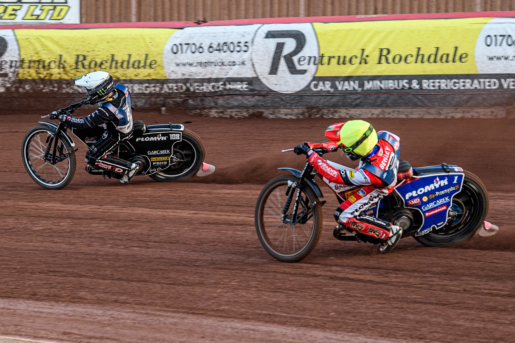 Dan Bewley in Yellow chases Tai Woffinden in White during the Attis Insurance Sports Division British Speedway Championship Final at the National Speedway Stadium, Manchester on Saturday 8th June 2024. (Photo: Ian Charles | MI News)