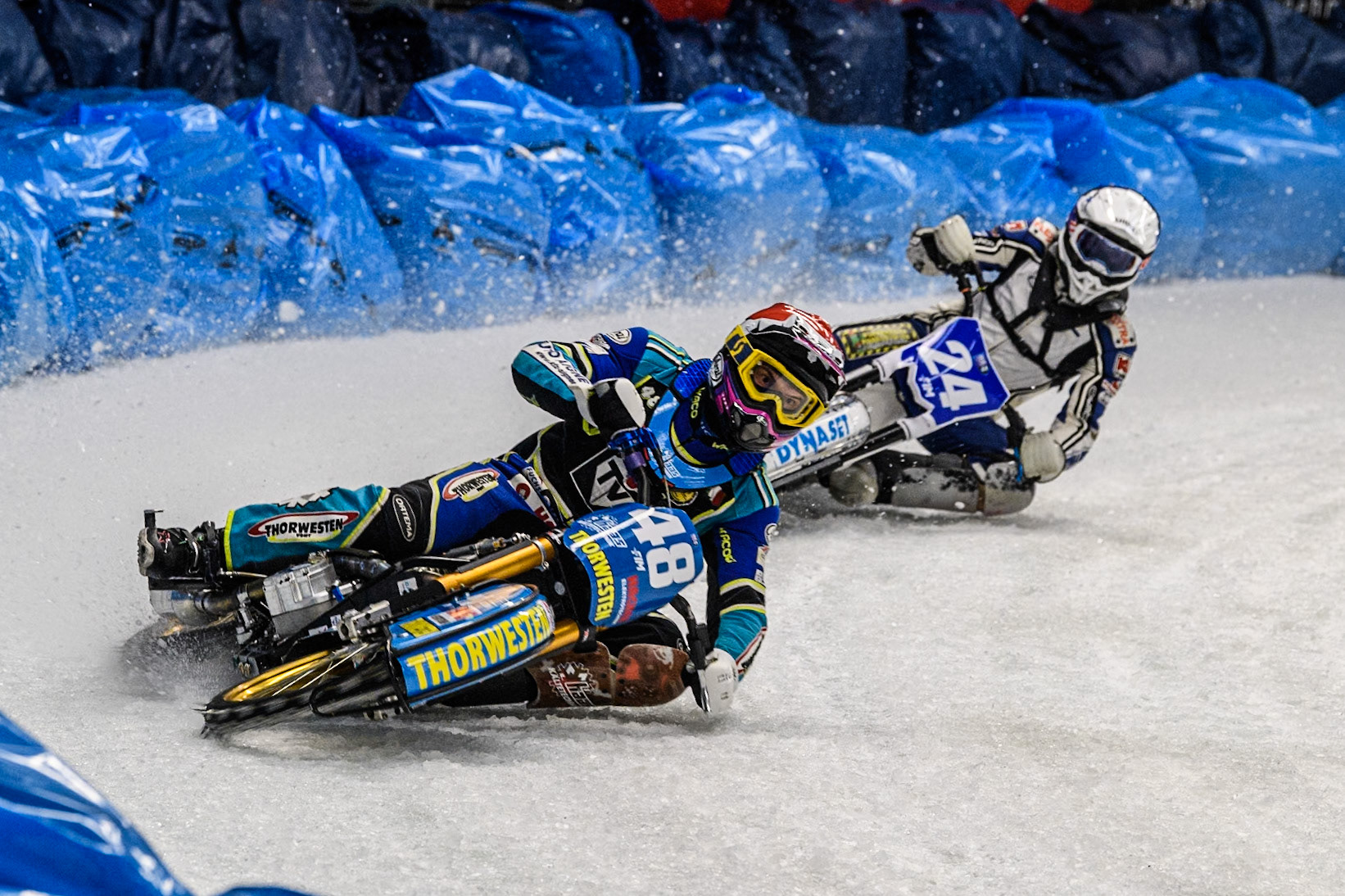 Luca Bauer (48) of Germany in Red leading Max Koivula (24) of Finland in White during the Ice Speedway Gladiators World Championship Final 2 at Max-Aicher-Arena, Inzell on Sunday 16th March 2025. (Photo: Ian Charles | MI News)