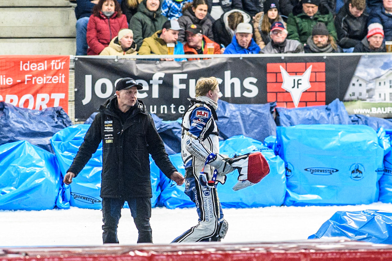 Max Koivula (24) of Finland walks back to the paddock after his fall during the Ice Speedway Gladiators World Championship Final 2 at Max-Aicher-Arena, Inzell on Sunday 16th March 2025. (Photo: Ian Charles | MI News)