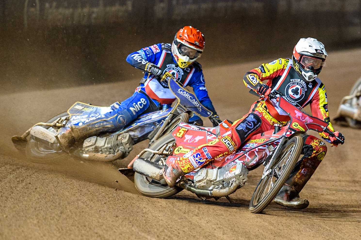 Australia's Max Fricke (White) leads England's Robert Lambert (Red) during the Peter Craven Memorial Trophy meeting at the National Speedway Stadium, Manchester on Monday 18th March 2024. (Photo: Ian Charles | MI News)