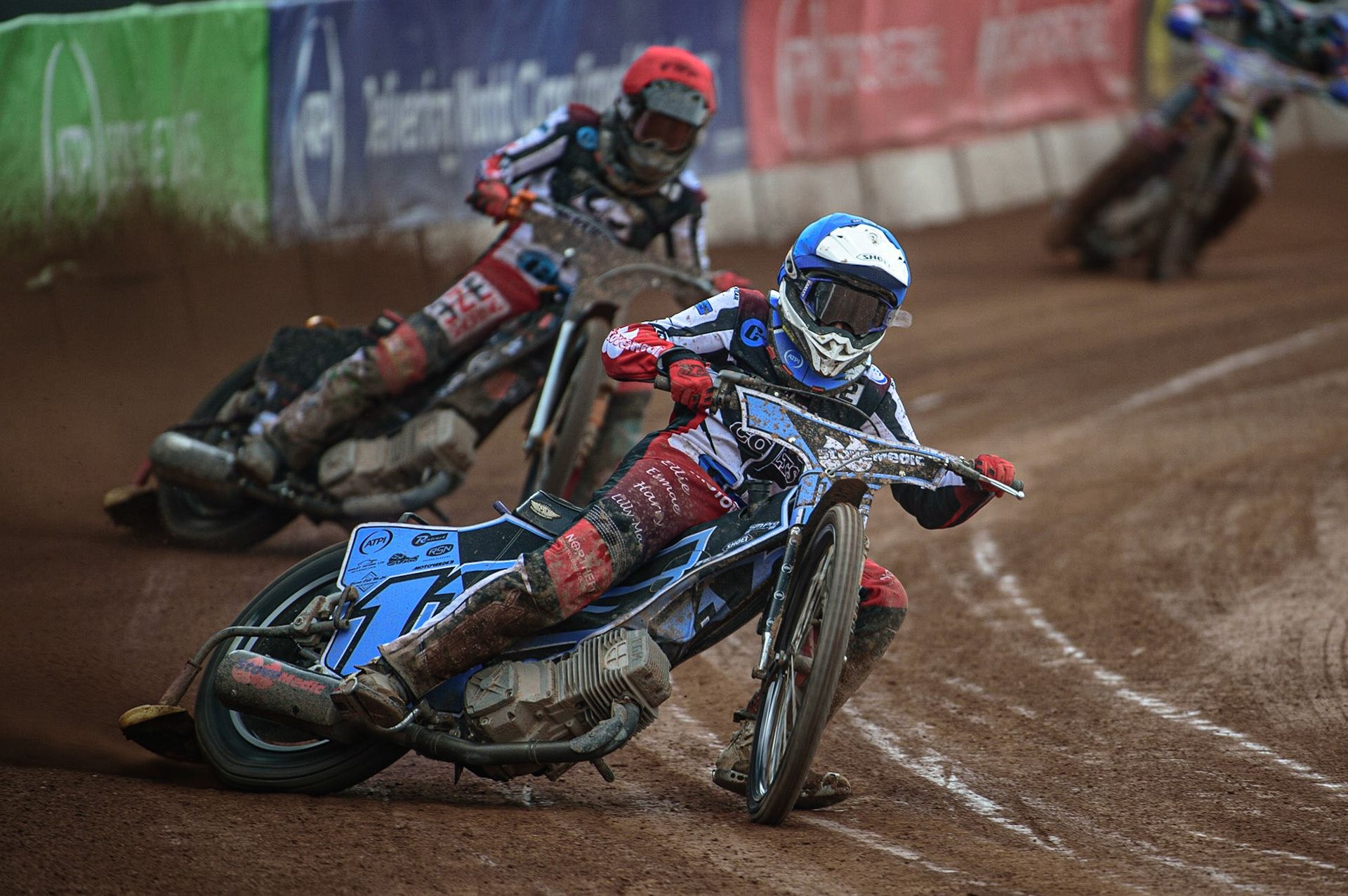 MANCHESTER, UK. APR 15TH  Sam McGurk  (Blue) leads Jack Smith  (Red) and Henry Atkins  (White)  during the National Development League match between Belle Vue Colts and Plymouth Centurions at the National Speedway Stadium, Manchester on Friday 15th April 2022. (Credit: Ian Charles | MI News)