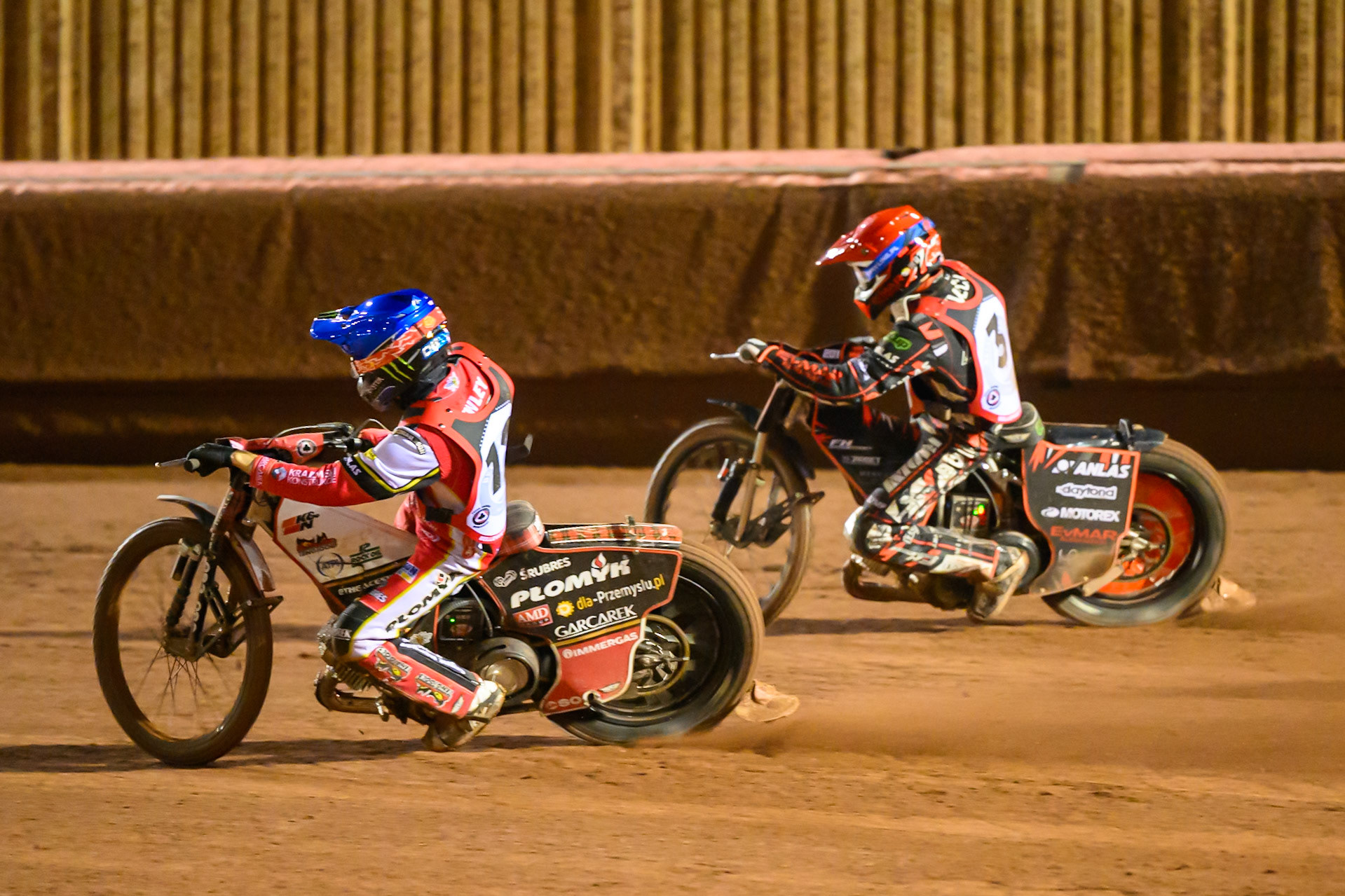Dan Bewley  in Blue passes Jan Kvech  in Red during the Peter Craven Memorial Trophy at the National Speedway Stadium, Manchester, on Monday 16th March 2026. (Photo: Ian Charles | MI News)