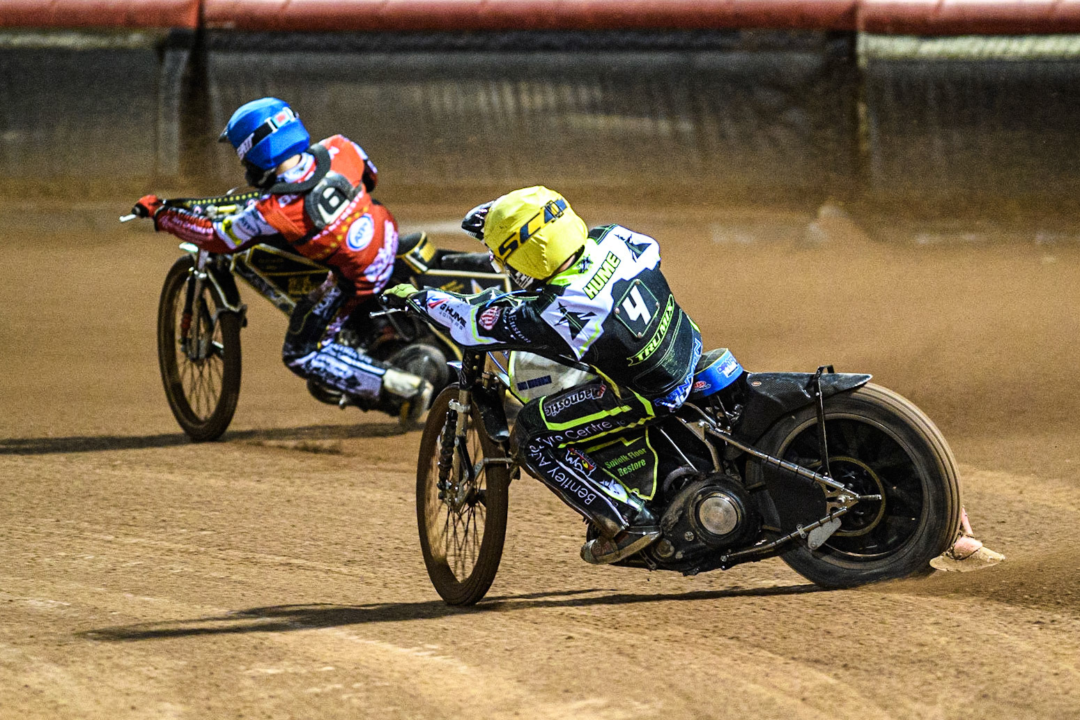 Danyon Hume (Yellow) chases Norick Blodorn (Blue) during the Sports Insure Premiership Semi Final Playoff 2nd leg match between Belle Vue Aces and Ipswich Witches at the National Speedway Stadium, Manchester on Monday 25th September 2023. (Photo: Ian Charles | MI News)