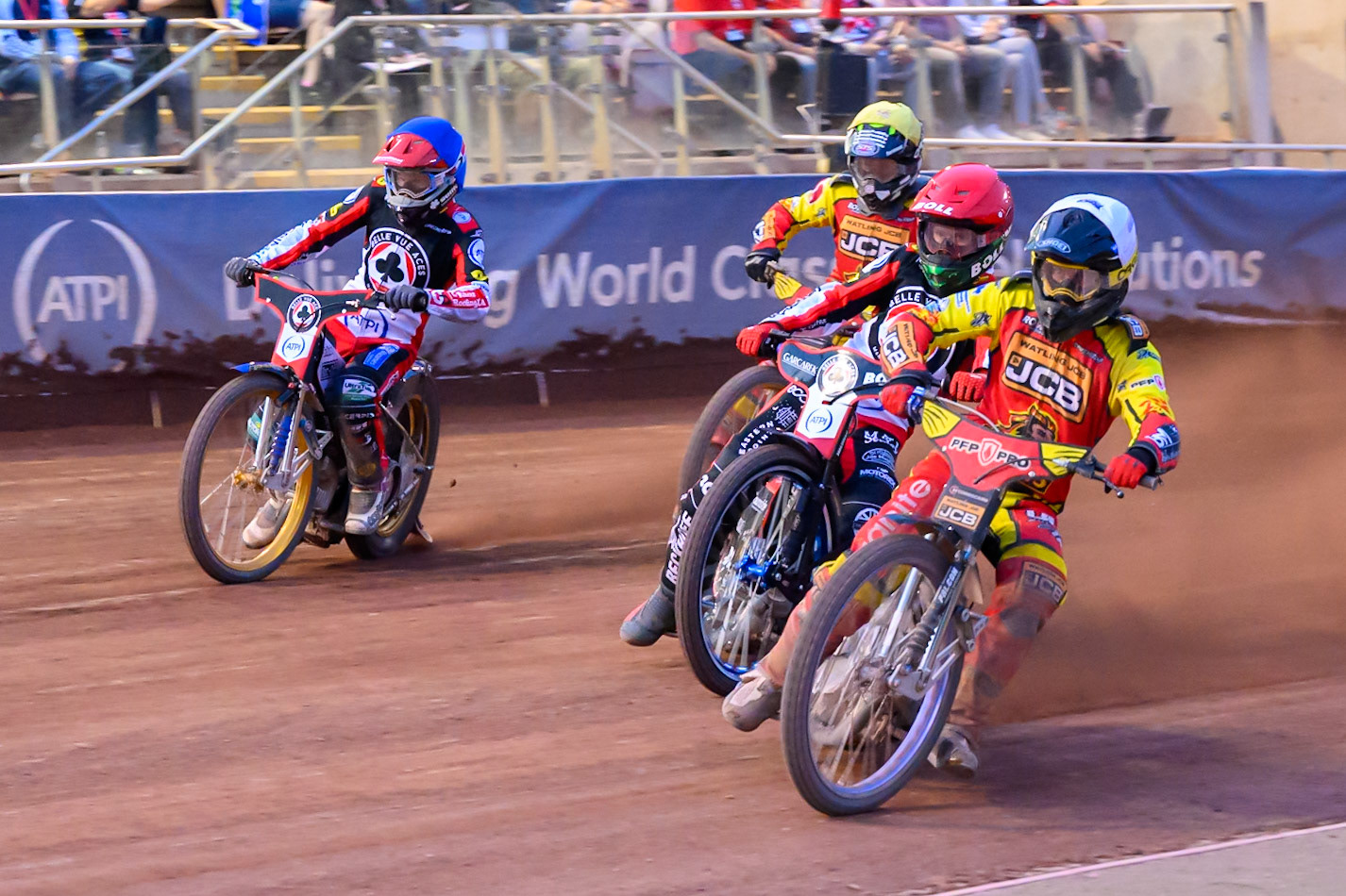 Ryan Douglas of Leicester Lions in White leading Brady Kurtz of Belle Vue Aces in Red , Joe Thompson of Leicester Lions in Yellow  and Jason Doyle of Belle Vue Aces in Blue during the Rowe Motor Oil Premiership match between Belle Vue Aces and Leicester Lions at the National Speedway Stadium, Manchester on Monday 3rd August 2026. (Photo: Ian Charles | MI News)