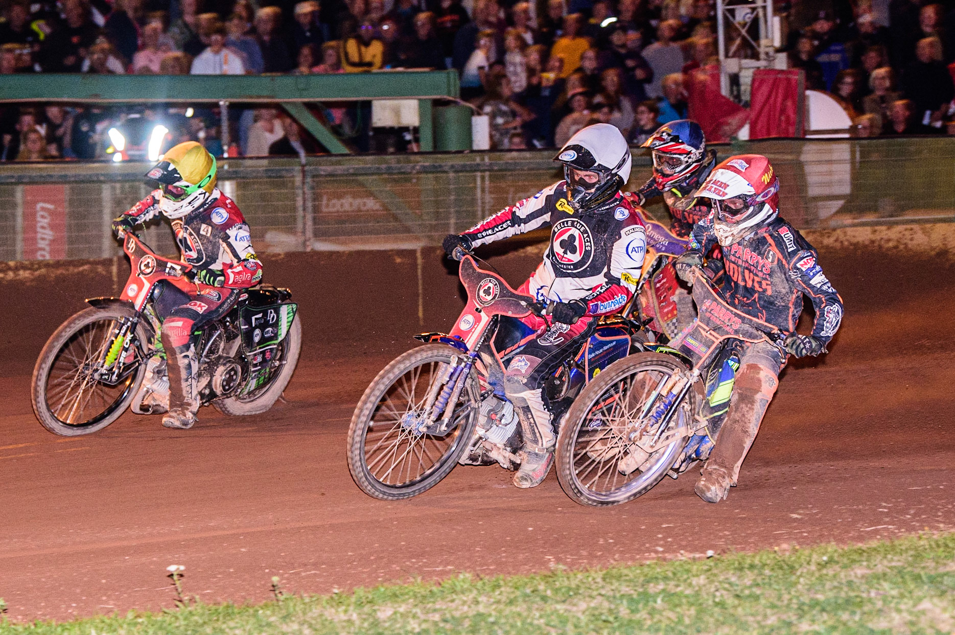 Brady Kurtz  (White) and Charles Wright  (Yellow) outside Nick Morris (Red) with Drew Kemp  (Blue) behind during the SGB Premiership match between Wolverhampton Wolves and Belle Vue Aces at Monmore Green Stadium, Wolverhampton on Monday 29th August 2022. (Credit: Ian Charles | MI News)
