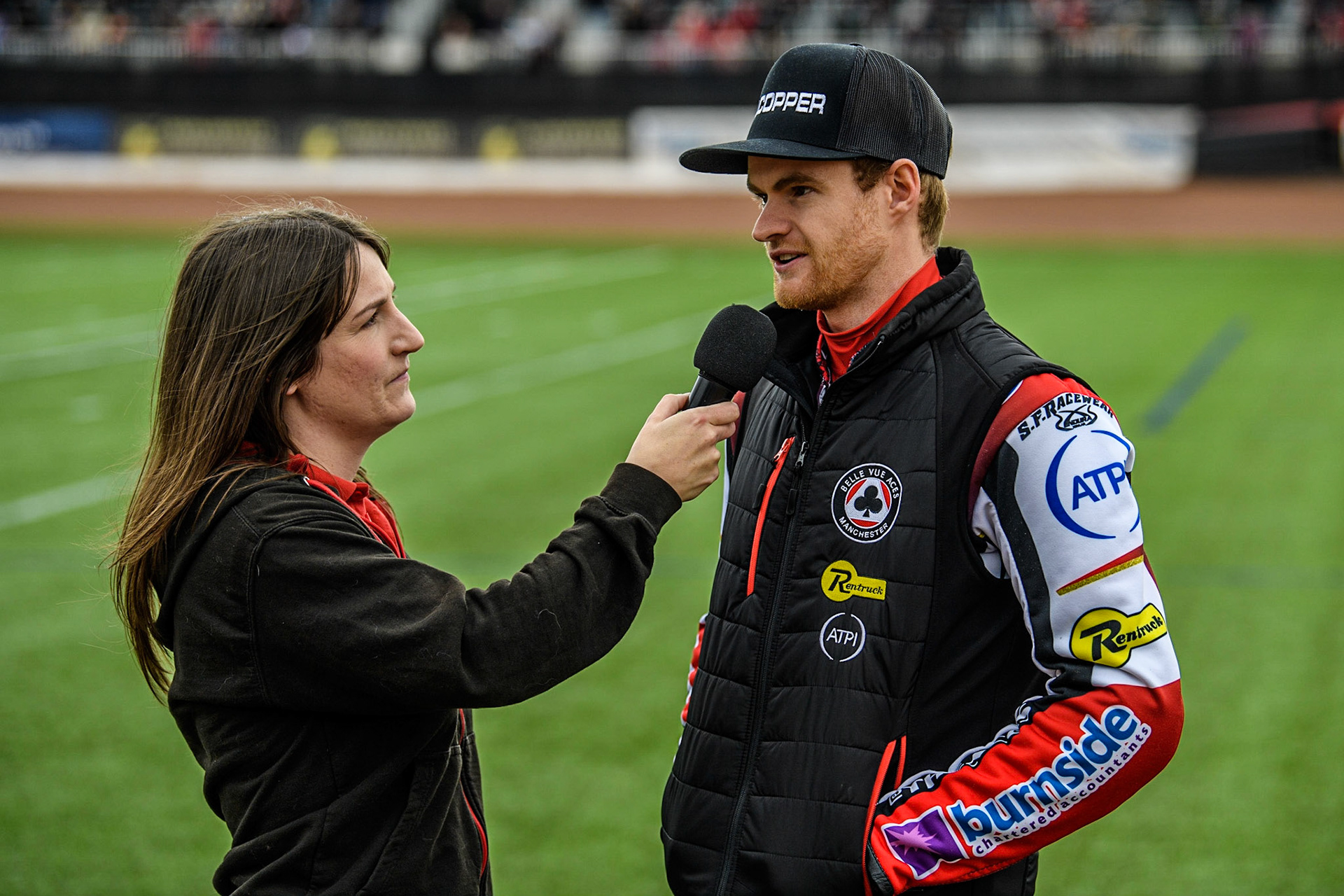 Dan Bewley  (right) gives an interview to Belle Vue presenter Hayley Bromley during the SGB Premiership match between Belle Vue Aces and Leicester Lions at the National Speedway Stadium, Manchester on Monday 1st May 2023. (Photo: Ian Charles | MI News)