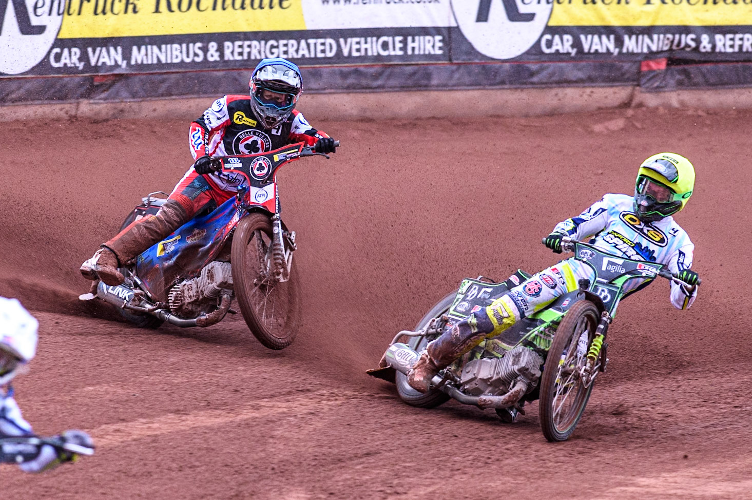 Belle Vue Aces' Ben Cook in Blue loses control after a tangle with Oxford Spires' Charles Wright in Yellow during the Rowe Motor Oil Premiership match between Belle Vue Aces and Oxford Spires at the National Speedway Stadium, Manchester on Monday 22nd July 2024. (Photo: Ian Charles | MI News)