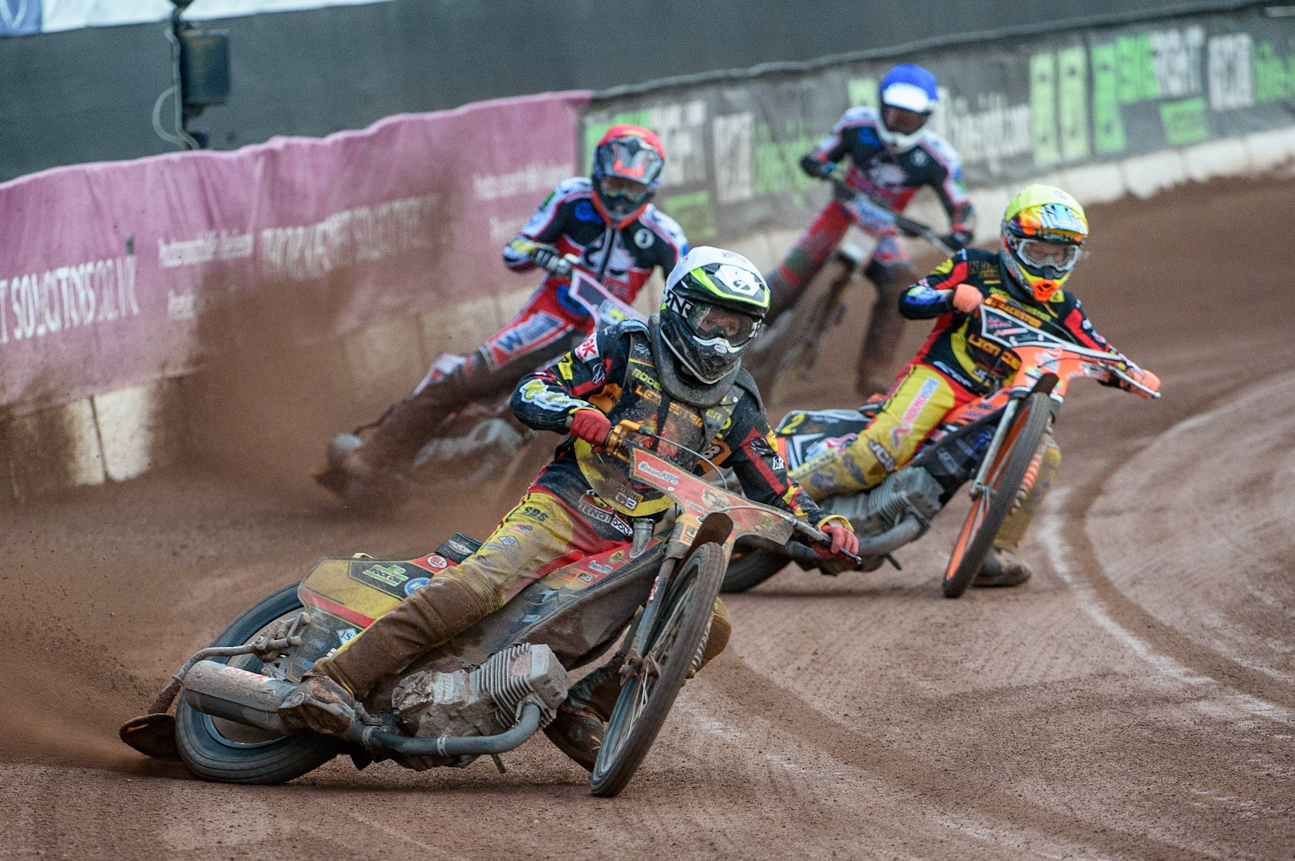 MANCHESTER, UK. JULY 29TH  Dan Thompson  (White) and Ben Trigger  (Yellow) lead Jack Parkinson-Blackburn  (Red) and Paul Bowen  (Blue) as they head for a maximum points heat win  during the National Development League match between Belle Vue Colts and Leicester Lion Cubs at the National Speedway Stadium, Manchester on Thursday 29th July 2021. (Credit: Ian Charles | MI News)