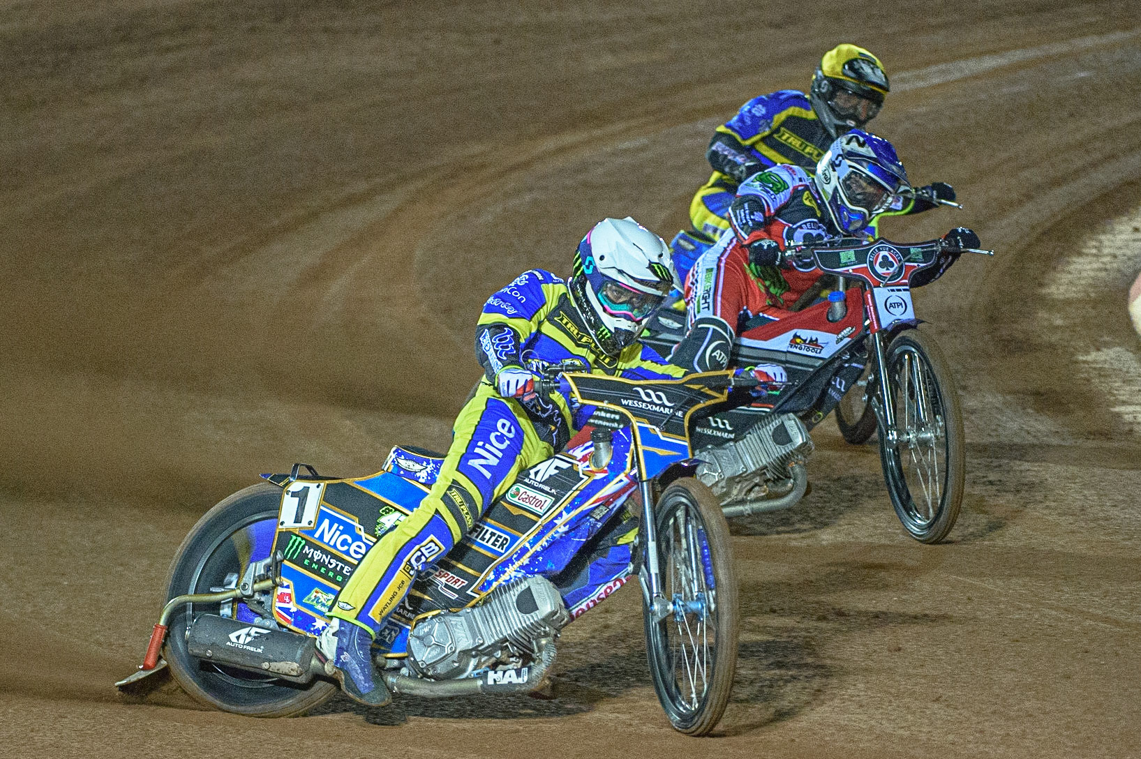 MANCHESTER, UK. OCT 7TH  Jack Holder  (White) leads Richie Worrall  (Blue) and Troy Batchelor  (Yellow) during the SGB Premiership Play off Semi-Final Second Leg between Belle Vue Aces and Sheffield Tigers at the National Speedway Stadium, Manchester on Thursday 7th October 2021. (Credit: Ian Charles | MI News)