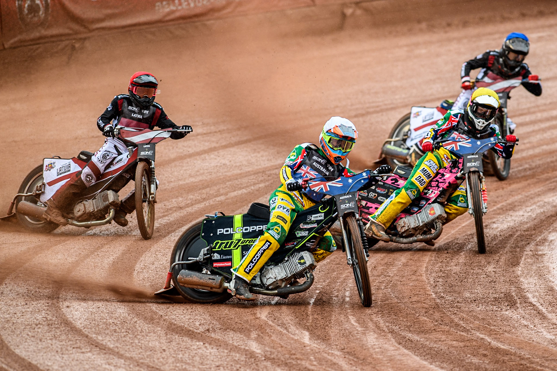 Keynan Rew of Australia in White leading James Pearson of Australia in Yellow, Nikita Kaulins of Latvia and Artjoms Juhno of Latvia in Blue during the Monster Energy FIM Speedway of Nations 2 (Under 21) Final at the National Speedway Stadium, Manchester on Friday 12th July 2024. (Photo: Ian Charles | MI News)