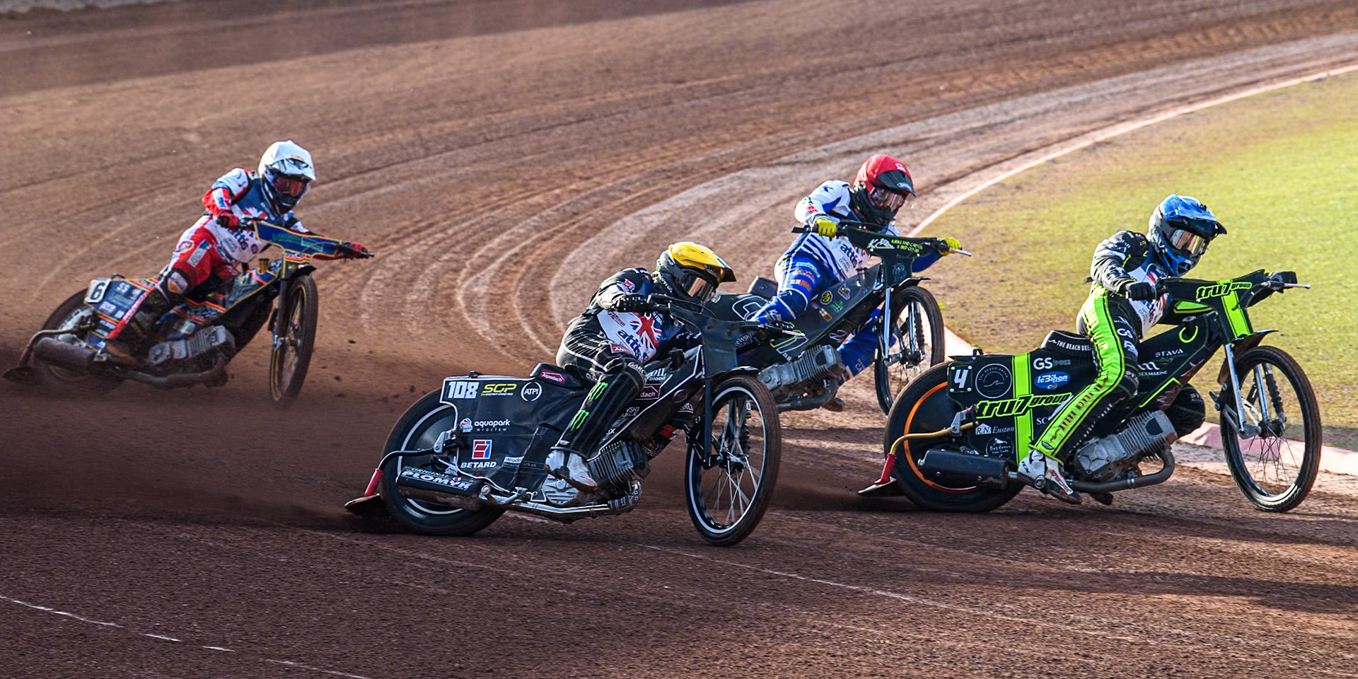 Adam Ellis in in Blue leading Tai Woffinden in Yellow, Craig Cook in Red and Connor Mountain in White during the Attis Insurance Sports Division British Speedway Championship Final at the National Speedway Stadium, Manchester on Saturday 8th June 2024. (Photo: Ian Charles | MI News)