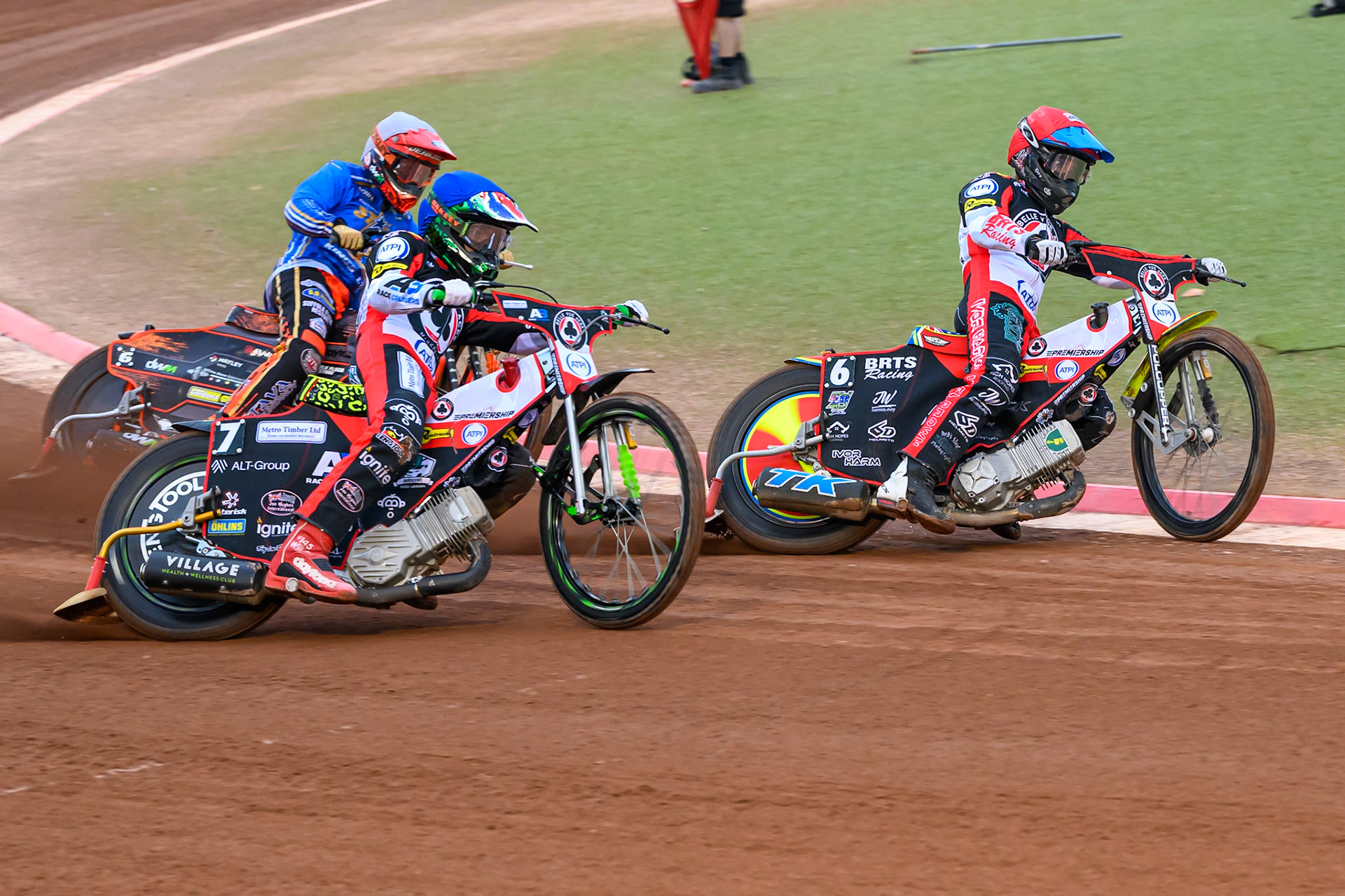 Tate Zischke of Belle Vue Aces in Red leading William Cairns of Belle Vue Aces in Blue andJordan Jenkins of Kings Lynn Stars in White during the Rowe Motor Oil Premiership match between Belle Vue Aces and King's Lynn Stars at the National Speedway Stadium, Manchester on Monday 29th June 2026. (Photo: Ian Charles | MI News)
