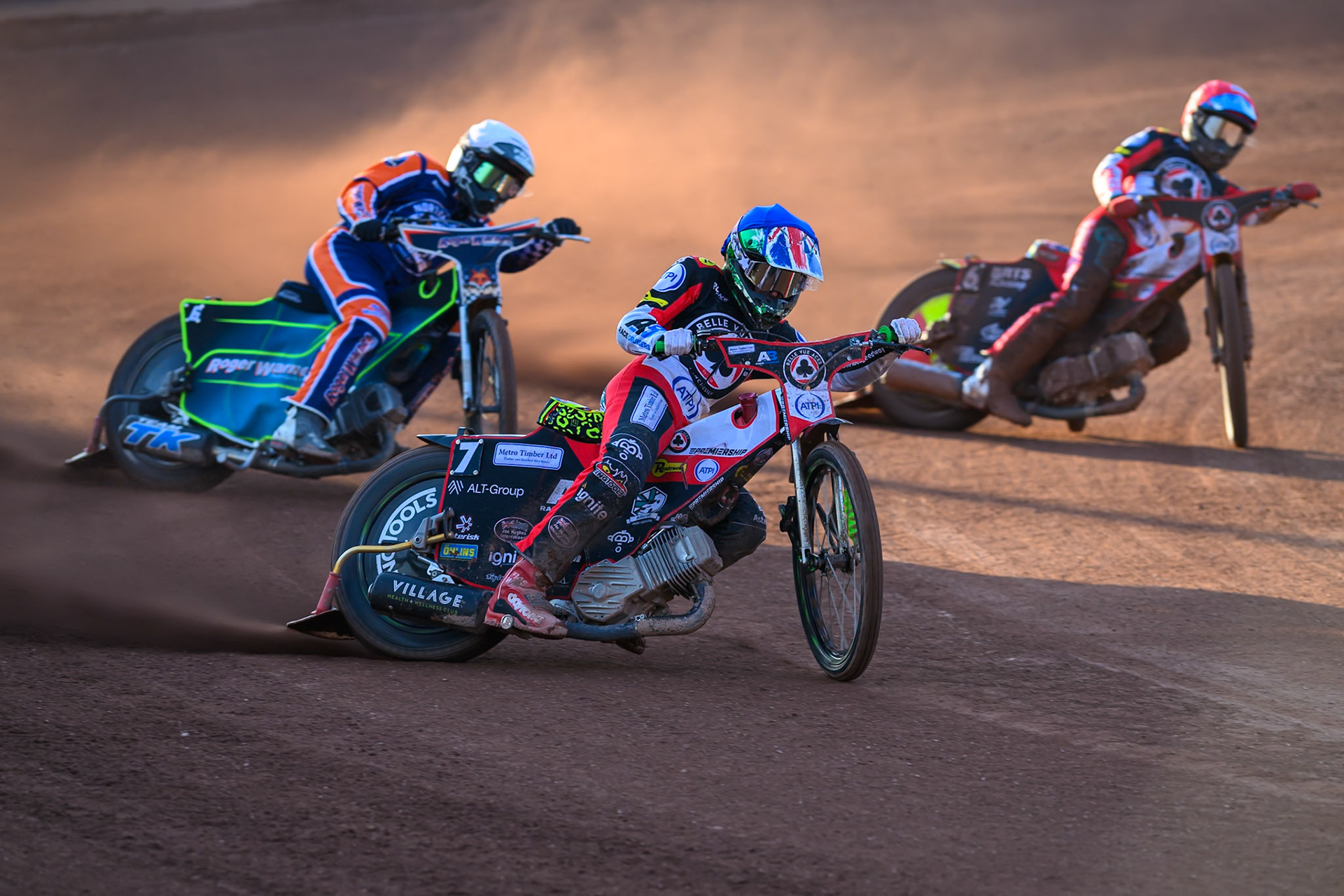 William Cairns of Belle Vue Aces in Blue leading Troy Batchelor of Northampton Foxes  in White  and Tate Zischke of Belle Vue Aces in Red during the Rowe Motor Oil Premiership match between Belle Vue Aces and Northampton Foxes at the National Speedway Stadium, Manchester on Monday 13th July 2026. (Photo: Ian Charles | MI News)