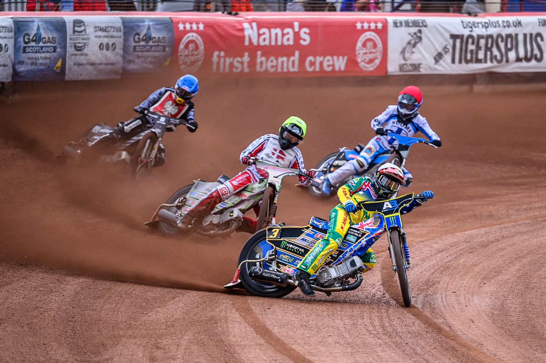 Jack Holder of Australia in White leading Jonas Knudsen of Denmark in Yellow, Maciej Janowski of Poland in Blue and Antti Vuolas of Finland in Red during the Speedway GP Qualifying Round 3 at Allied Ashfield Stadium, Glasgow on Saturday 30th May 2026. (Photo: Ian Charles | MI News)