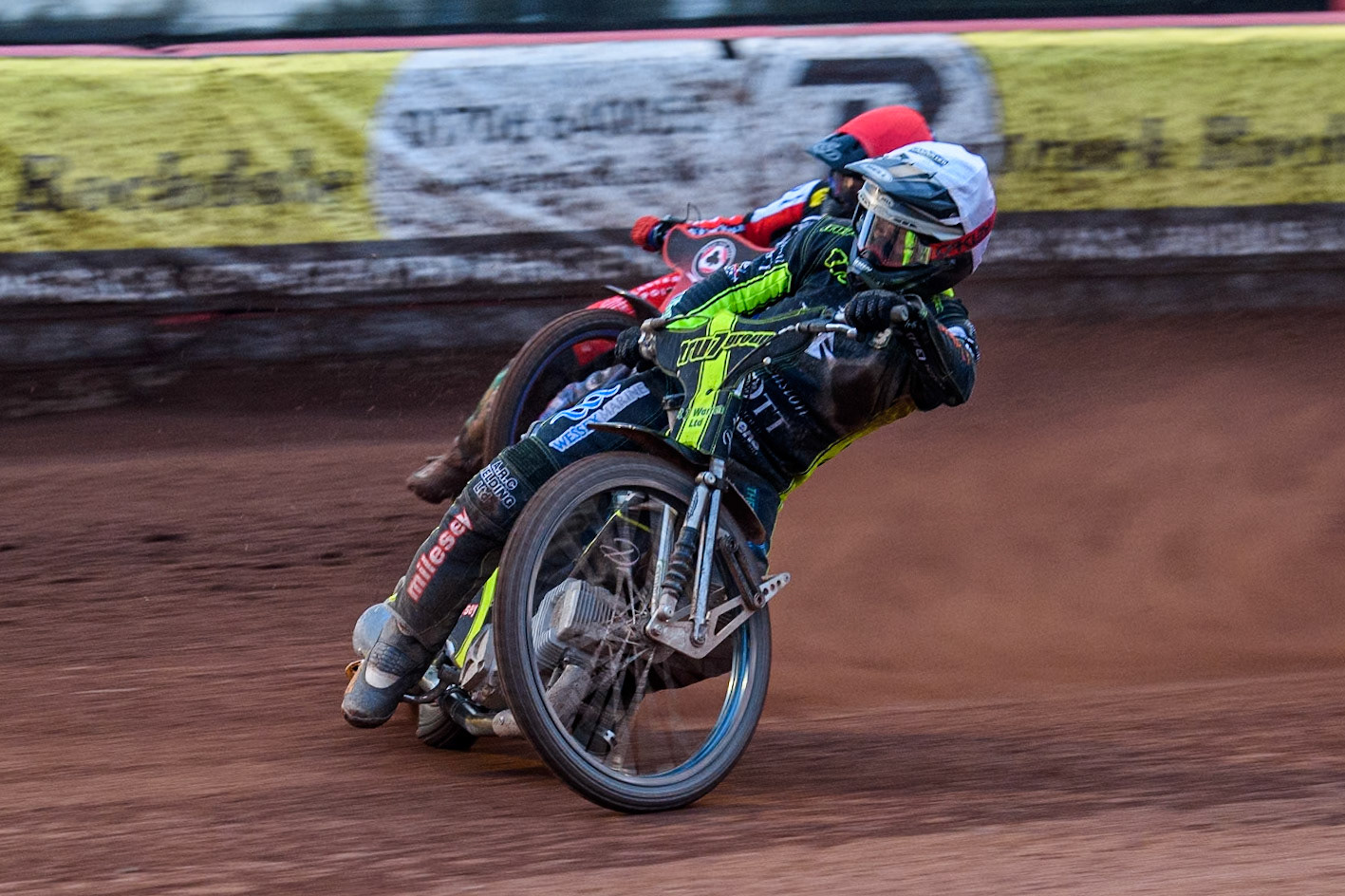 Ipswich Witches' Danny King in White leading Belle Vue Aces' Brady Kurtz  in Red during the Rowe Motor Oil Premiership match between Belle Vue Aces and Ipswich Witches at the National Speedway Stadium, Manchester on Monday 1st July 2024. (Photo: Ian Charles | MI News)