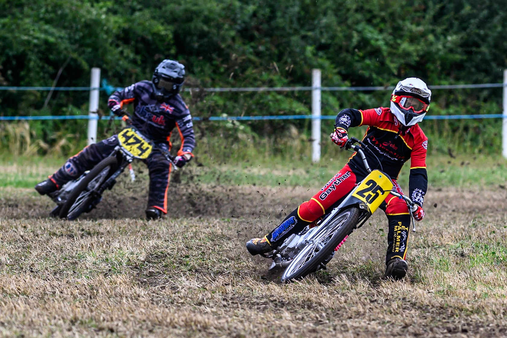 Neil Perrone (25) leading Jack Roberts (474) in the 500cc Class during the ACU Northern Grass Track Riders Championship at Cheshire Grass Track Club, Frog Lane, Knutsford, Cheshire on Sunday 20th July 2025. (Photo: Ian Charles | MI News)