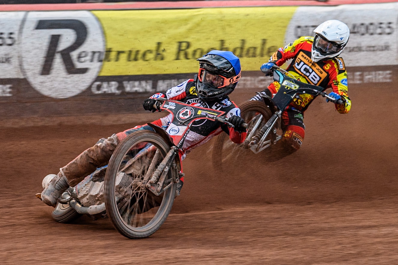 Belle Vue Aces' Ben Cook in Blue leading Leicester Lions' Ryan Douglas in White during the Rowe Motor Oil Premiership match between Belle Vue Aces and Leicester Lions at the National Speedway Stadium, Manchester on Monday 24th June 2024. (Photo: Ian Charles | MI News)