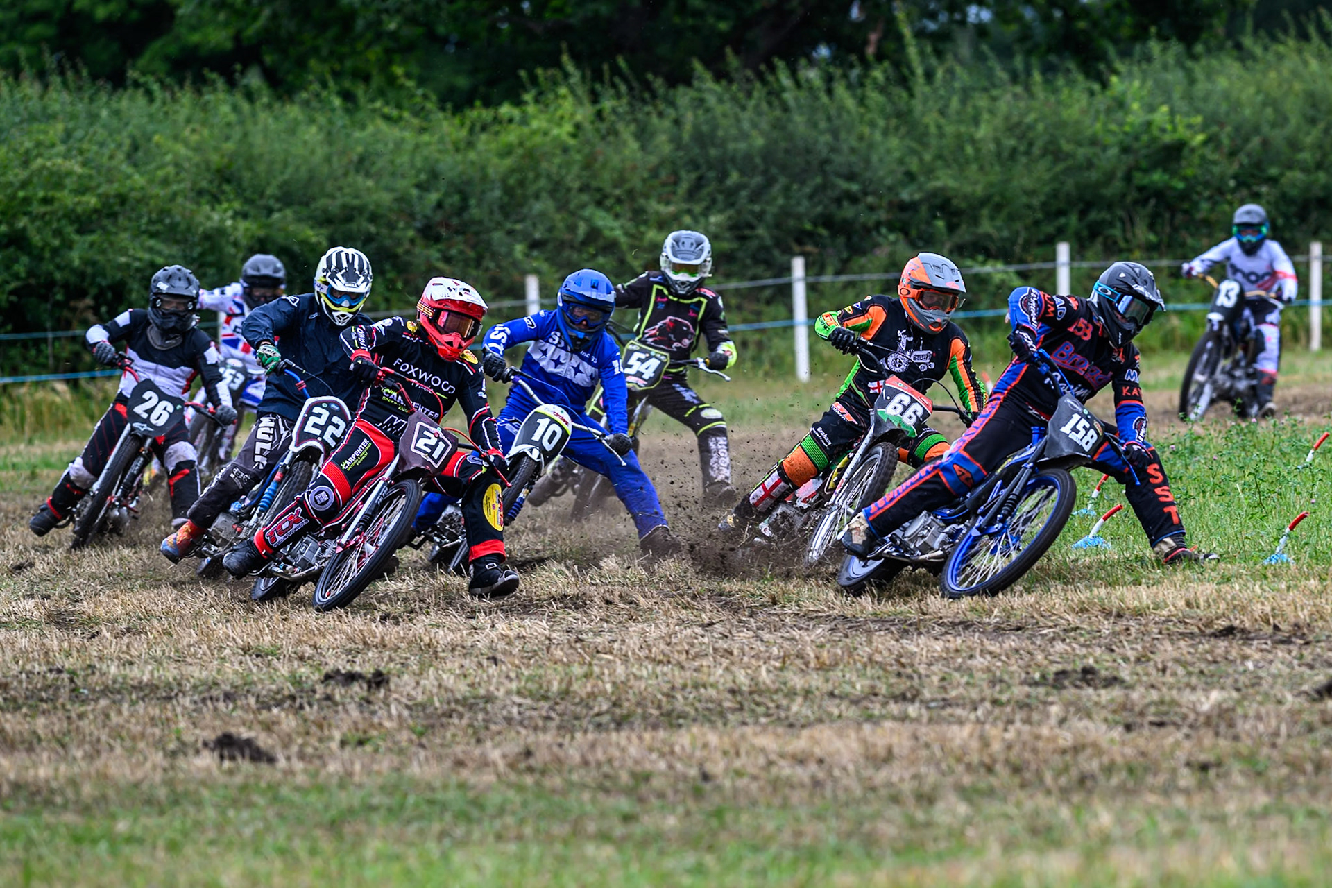 Wayne Broadhurst (158), Mark Scopes (21) Kevin Gwillam (66) and Tony Atkin (10) lead the pack in the GT140 Class during the ACU Northern Grass Track Riders Championship at Cheshire Grass Track Club, Frog Lane, Knutsford, Cheshire on Sunday 20th July 2025. (Photo: Ian Charles | MI News)