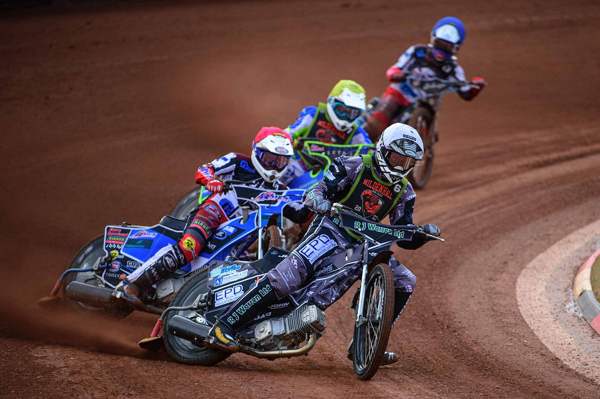 Josh Warren  (White) leads Archie Freeman  (Red) Luke Muff  (Yellow) and Freddy Hodder  (Blue) during the National Development League match between Belle Vue Colts and Mildenhall Fens Tigers at the National Speedway Stadium, Manchester on Friday 15th July 2022. (Credit: Ian Charles | MI News)