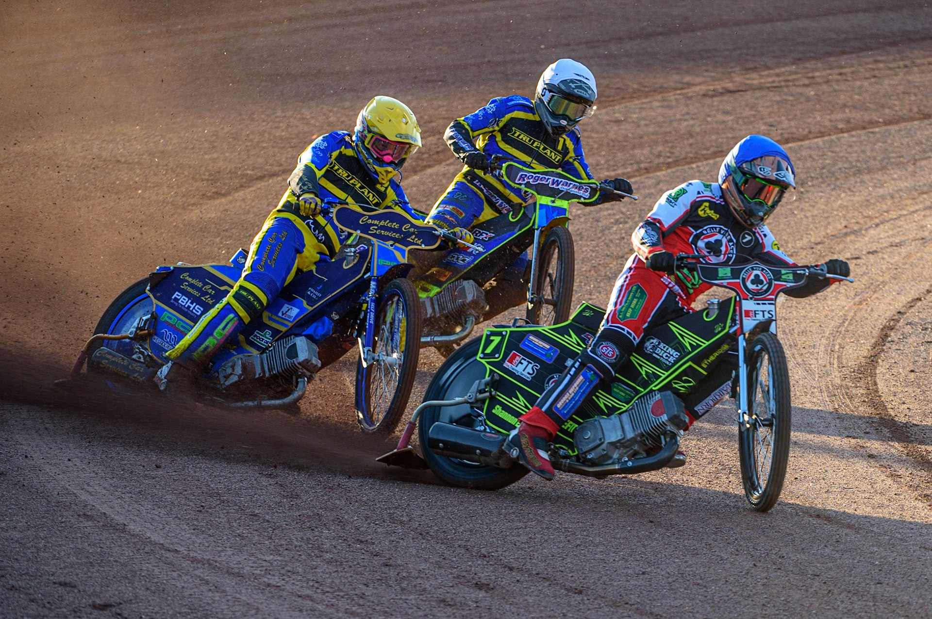 Photo: Ian CharlesJye Etheridge (Blue) leads the opening heat from Sheffield TruPlant Tigers’ Kyle Howarth   (Yellow) and Troy Batchelor  (White)Belle Vue Aces v Sheffield Tigers, British Speedway Premier League, National Speedway Stadium, Manchester Monday  17  May  2021