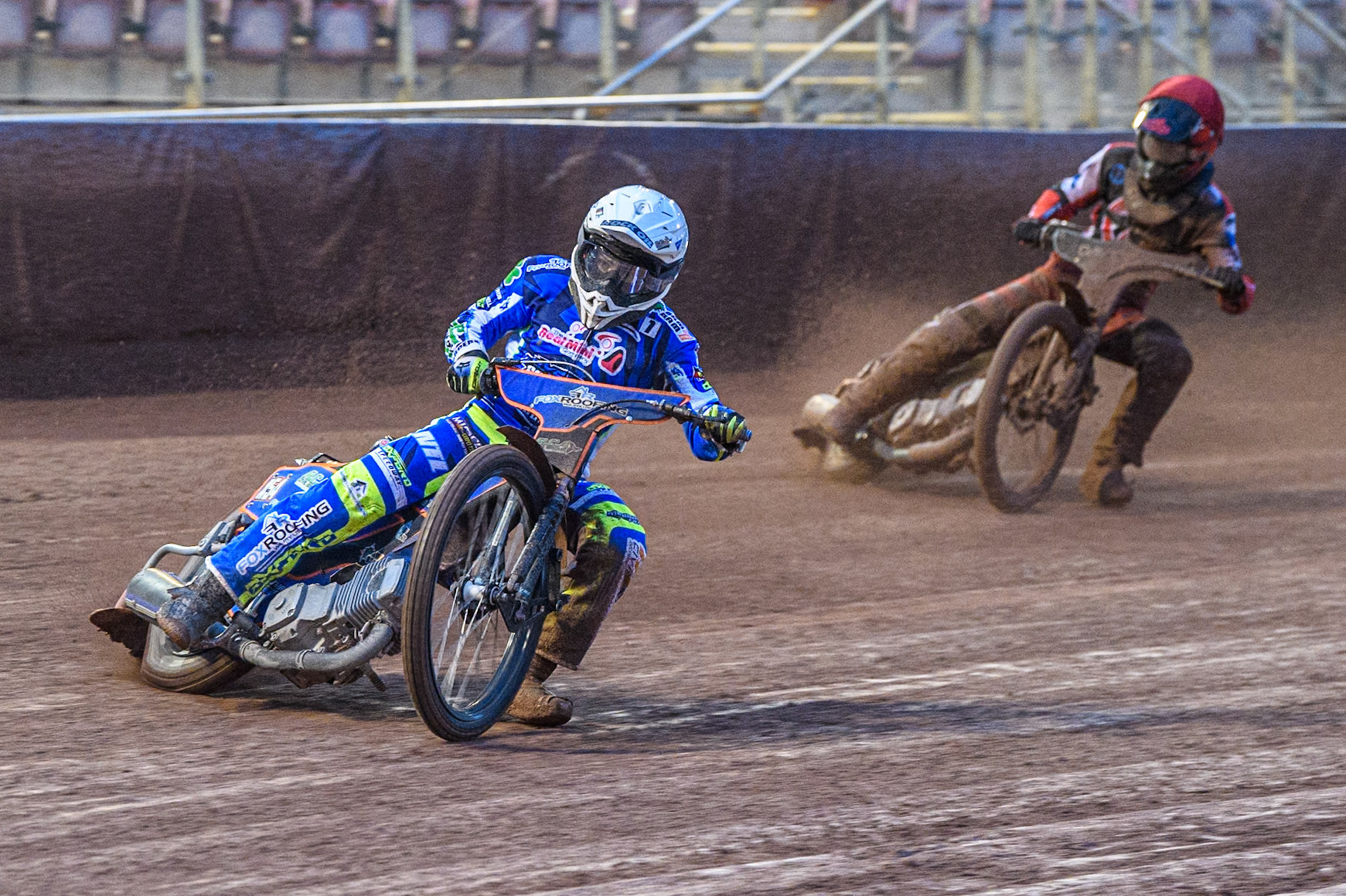 Oxford Chargers' Luke Killeen  in White leading Belle Vue Colts' Freddy Hodder  in Red during the WSRA National Development League match between Belle Vue Colts and Oxford Chargers at the National Speedway Stadium, Manchester on Friday 2nd August 2024. (Photo: Ian Charles | MI News)