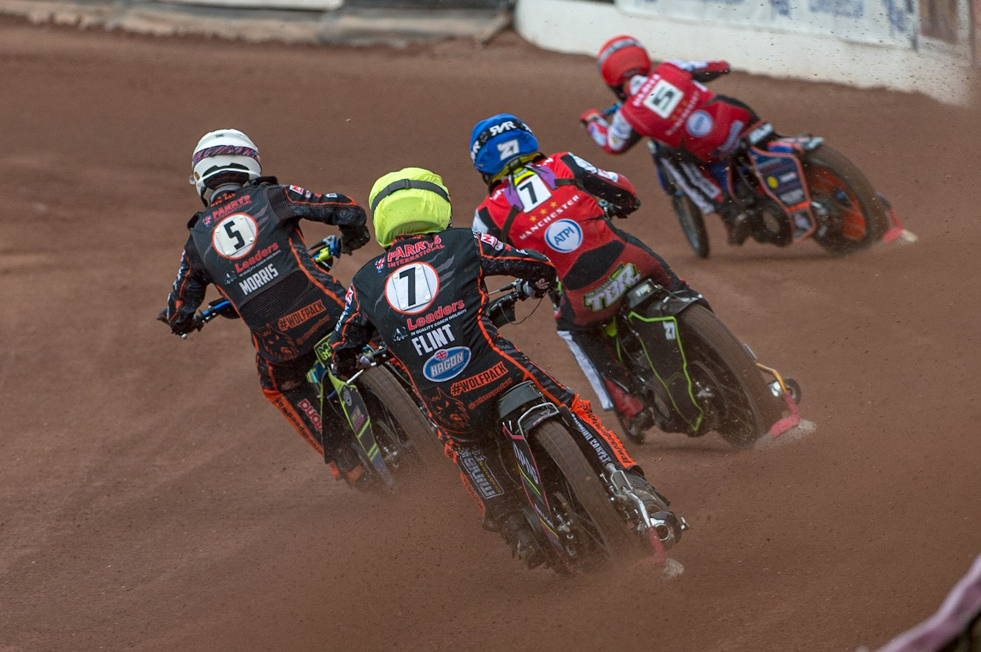 MANCHESTER, UK. JUN 13TH  Leon Flint  (Yellow) chases Nick Morris  (White) Tom Brennan  (Blue) and Brady Kurtz  (Red) during the SGB Premiership match between Belle Vue Aces and Wolverhampton  Wolves at the National Speedway Stadium, Manchester on Monday 13th June 2022. (Credit: Ian Charles | MI News)