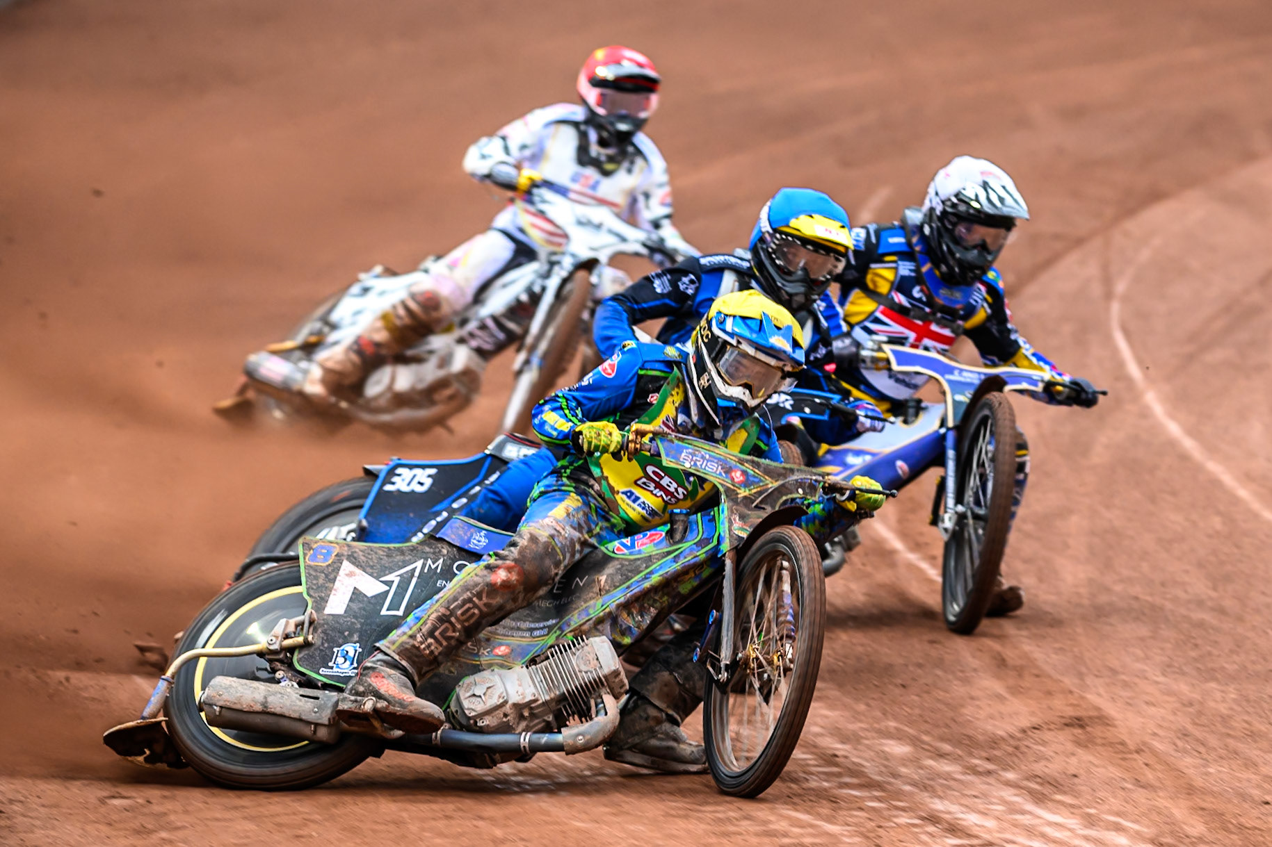 Michael West of Australia in Yellow leading Antoni Mencel of Poland in Blue, Joe Thompson of Great Britain in White and Slater Lightcap of The United States in Red during the FIM SGP2 Qualifying Round at the Peugeot Ashfield Stadium in Glasgow on Saturday 24th May 2025. (Photo: Ian Charles | MI News)