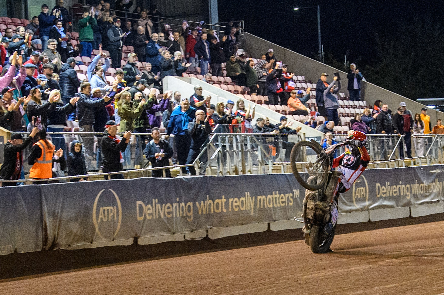 Belle Vue Aces' Jaimon Lidsey celebrates with a wheelie during the Rowe Motor Oil Premiership Play Off Semi Final 2, 1st Leg match between Belle Vue Aces and Sheffield Tigers at the National Speedway Stadium, Manchester on Monday 16th September 2024. (Photo: Ian Charles | MI News)