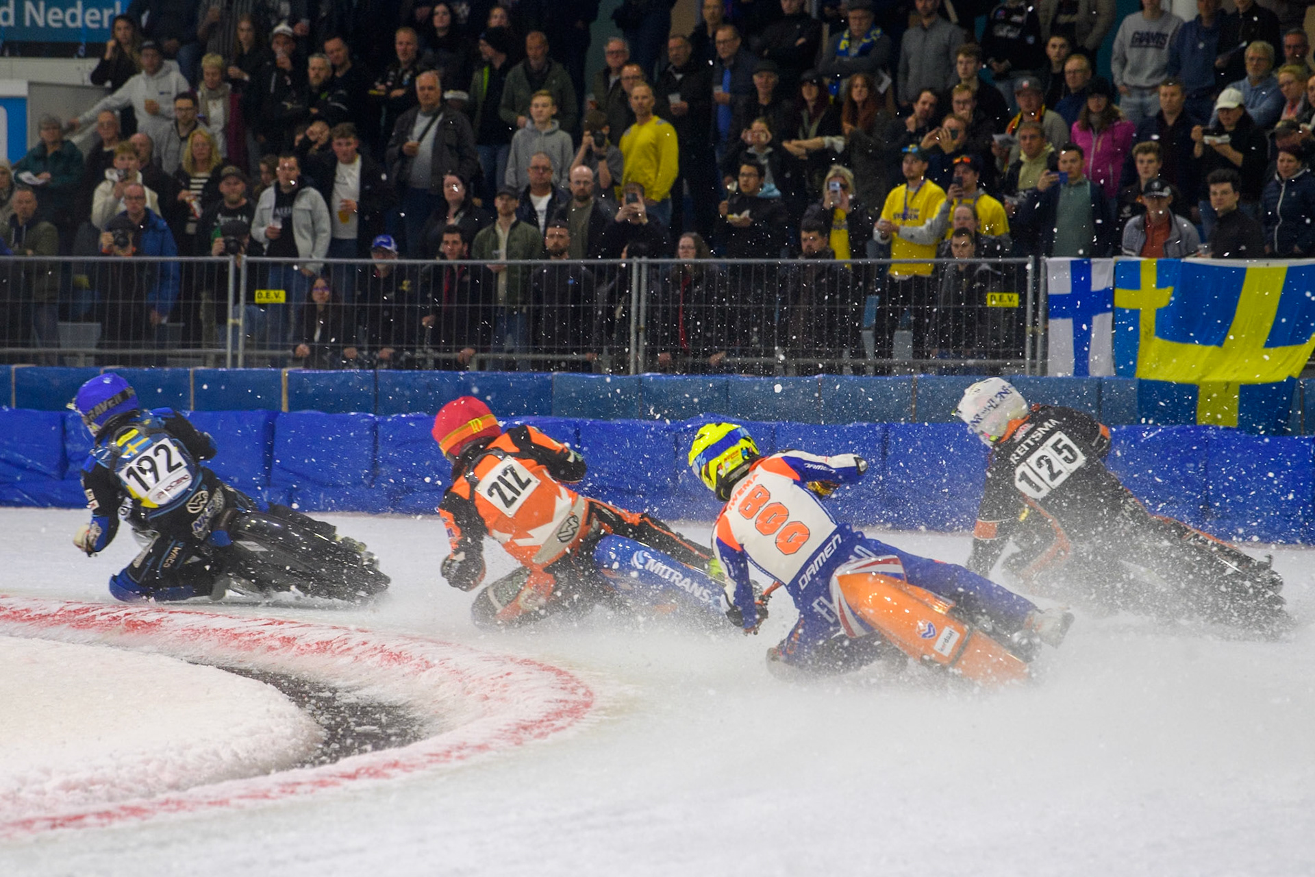 Jasper Iwema (800) of The Netherlands in Yellow chases Sebastian Reitsma (125) of The Netherlands in White Lukas Hutla (212) of the Czech Republic in Red and Niclas Svensson (192) of Sweden in Blue during the FIM Ice Speedway Gladiators World Championship, Final 3 at the Ice Stadium, Thialf, Heerenveen on Saturday 5th April 2025. (Photo: Ian Charles | MI News)