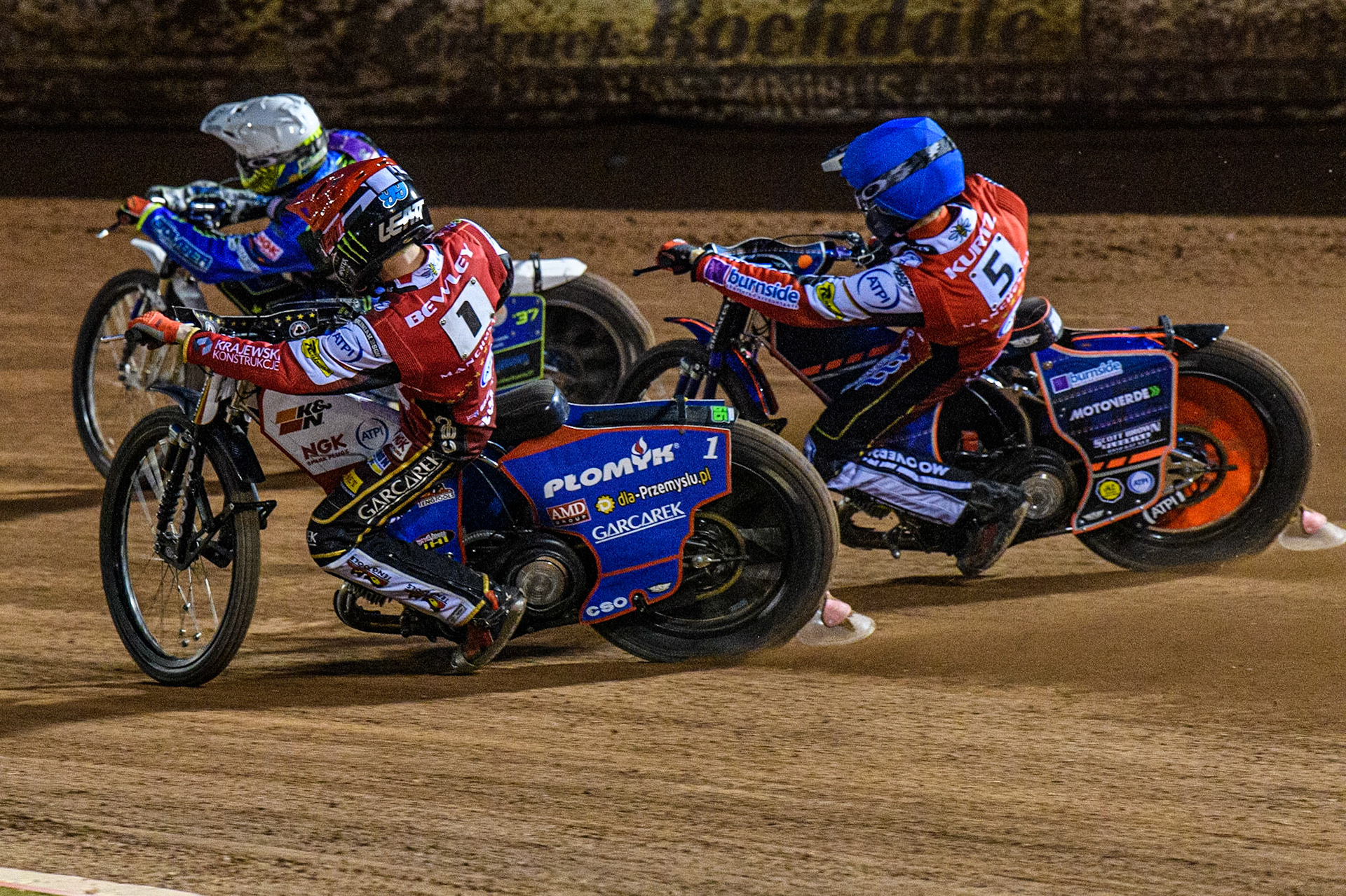 Dan Bewley  (Red) and Brady Kurtz  (Blue) inside Chris Harris   (White) during the SGB Premiership match between Belle Vue Aces and Peterborough at the National Speedway Stadium, Manchester on Monday 24th April 2023. (Photo: Ian Charles | MI News)