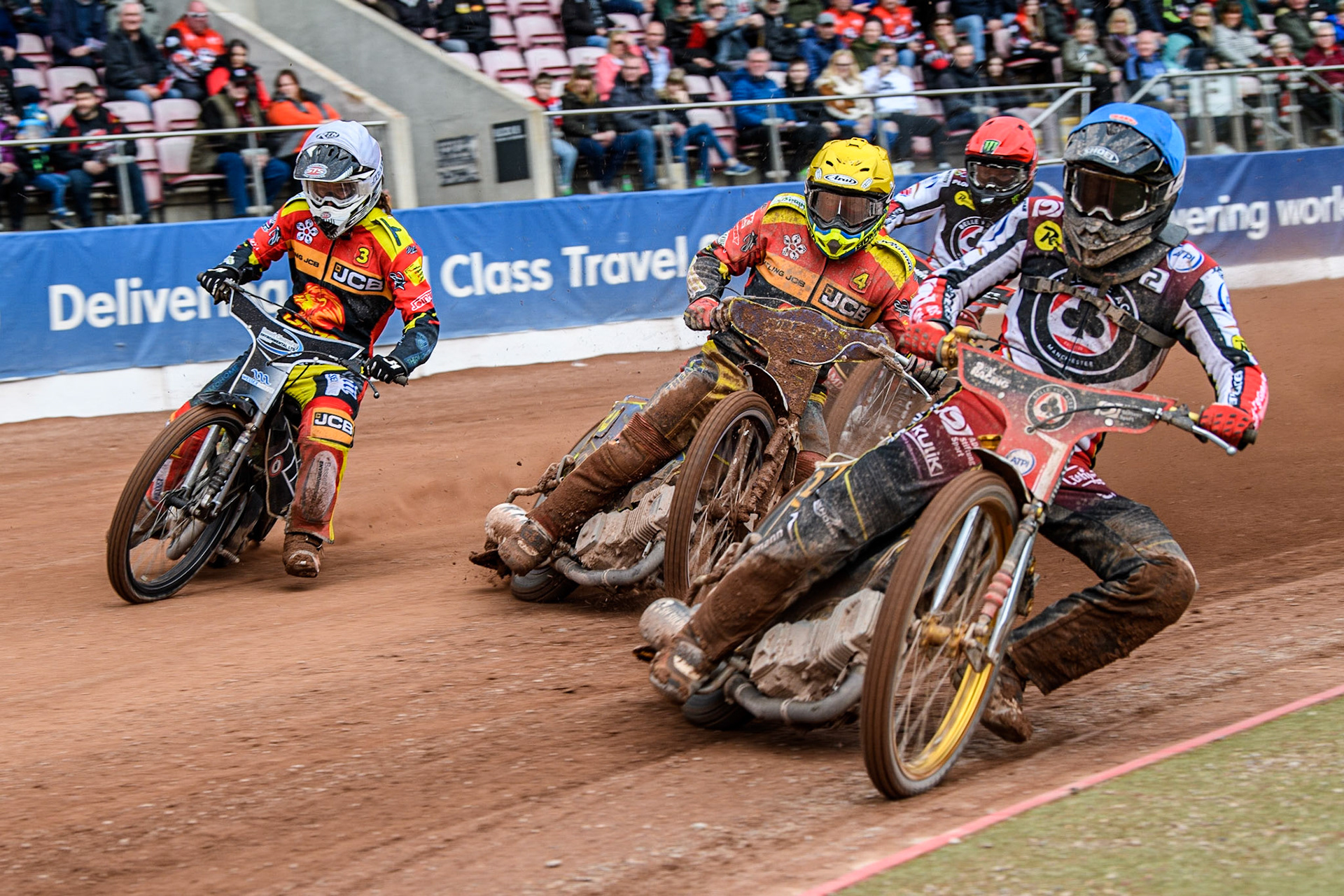 Norick Blodorn  (Blue) leads Chris Harris  (Yellow) Richard Lawson  (White) and Dan Bewley  (Red) during the SGB Premiership match between Belle Vue Aces and Leicester Lions at the National Speedway Stadium, Manchester on Monday 1st May 2023. (Photo: Ian Charles | MI News)