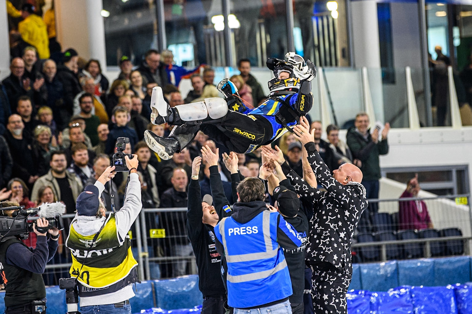 Martin Haarahiltunen (199) of Sweden gets the Champions bumps during the FIM Ice Speedway Gladiators World Championship, Final 4 at the Ice Stadium, Thialf, Heerenveen on Sunday 6th April 2025. (Photo: Ian Charles | MI News)