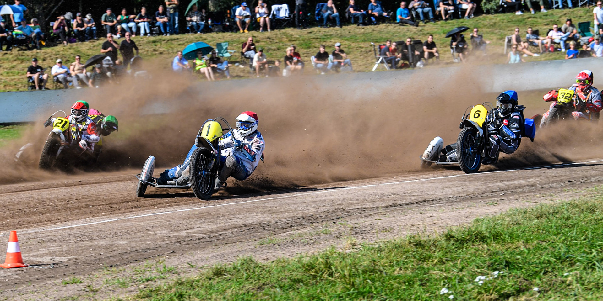 Wilfred Detz &amp; Britget Portijk (1) of The Netherlands  in Red leading Jérémy Malpeyre &amp; Dylan Bouillard (21) of France in Green  Mike Frederiksen &amp; Jette Maersk (6) of Denmark in Blue Clement &amp; Romain Furet (32) of France in Black &amp; White in the Sidecar Support Class during the FIM Long Track World Championship Final 5 at the Speed Centre Roden, Roden, Netherlands on Sunday 22nd September 2024. (Photo: Ian Charles | MI News)