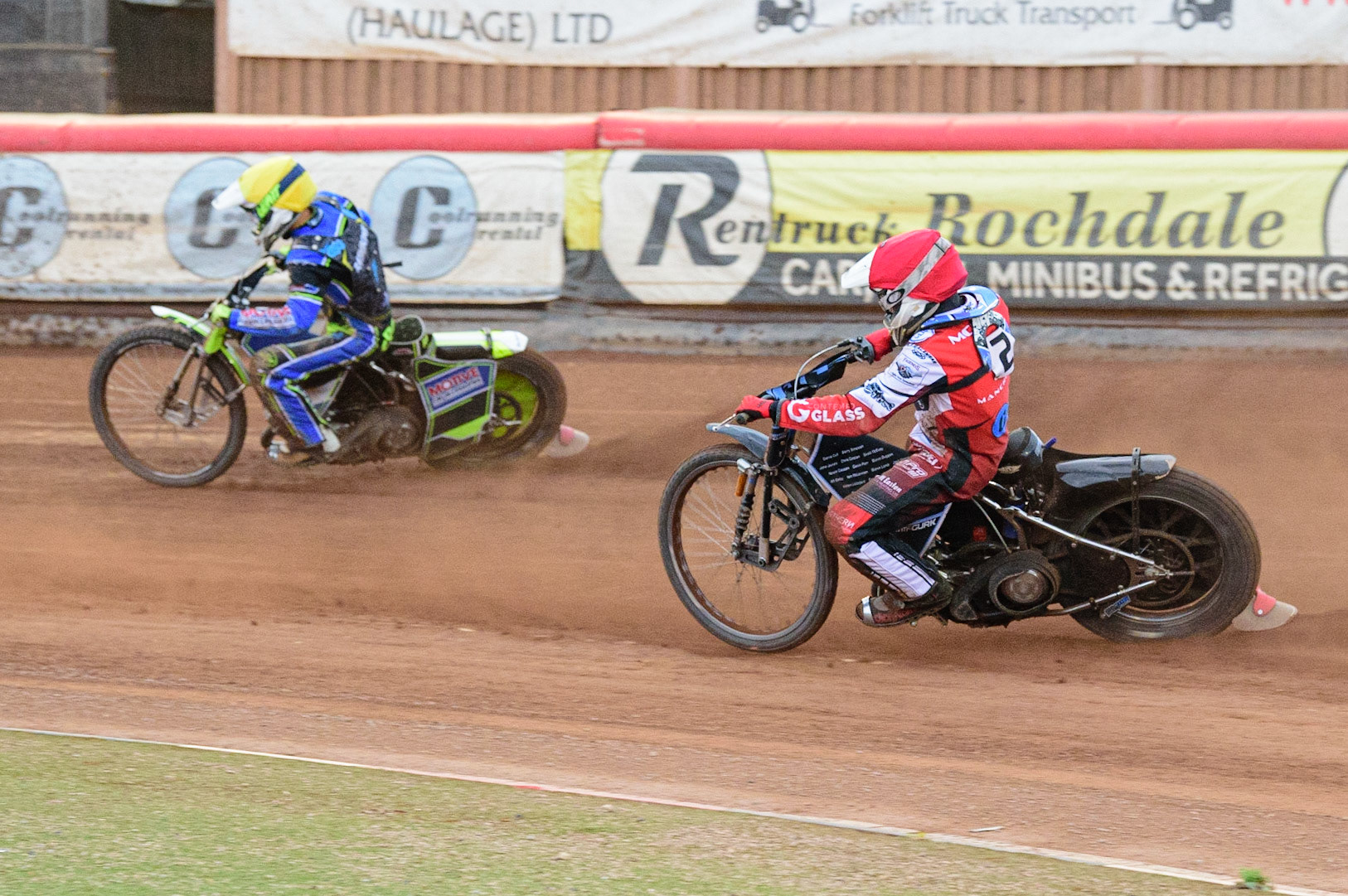 MANCHESTER, UK. JUN 24TH  Sam McGurk  (Red) chases Ben Rathbone  (Yellow) during the National Development League match between Belle Vue Colts and Berwick Bullets at the National Speedway Stadium, Manchester on Friday 24th June 2022. (Credit: Ian Charles | MI News)