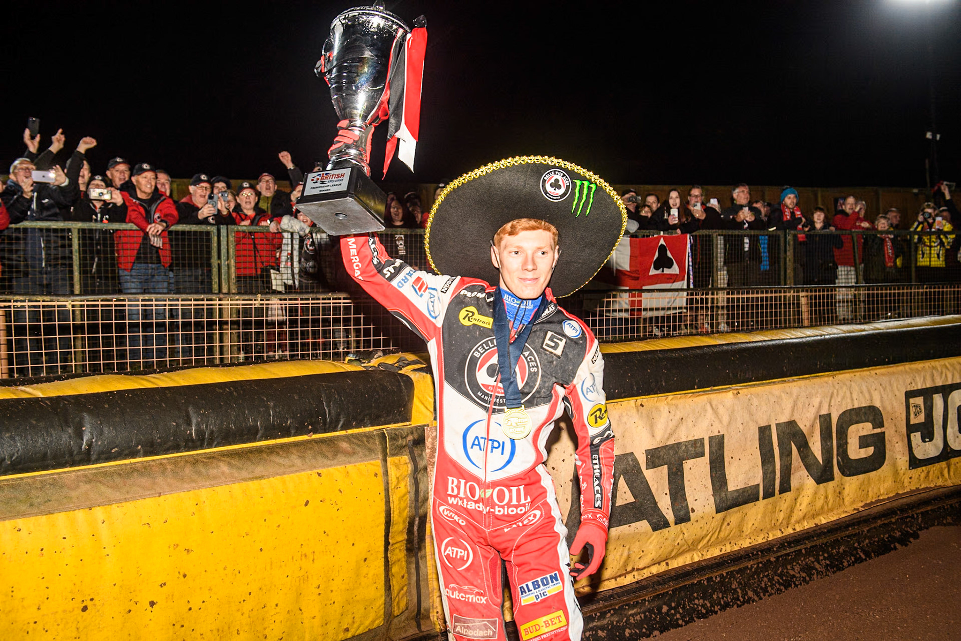 Belle Vue Aces' Dan Bewley  celebrates with the trophy  during the Rowe Motor Oil Premiership Grand Final 2nd Leg between Leicester Lions and Belle Vue Aces at the Pidcock Motorcycles Arena, Leicester on Thursday 26th September 2024. (Photo: Ian Charles | MI News)