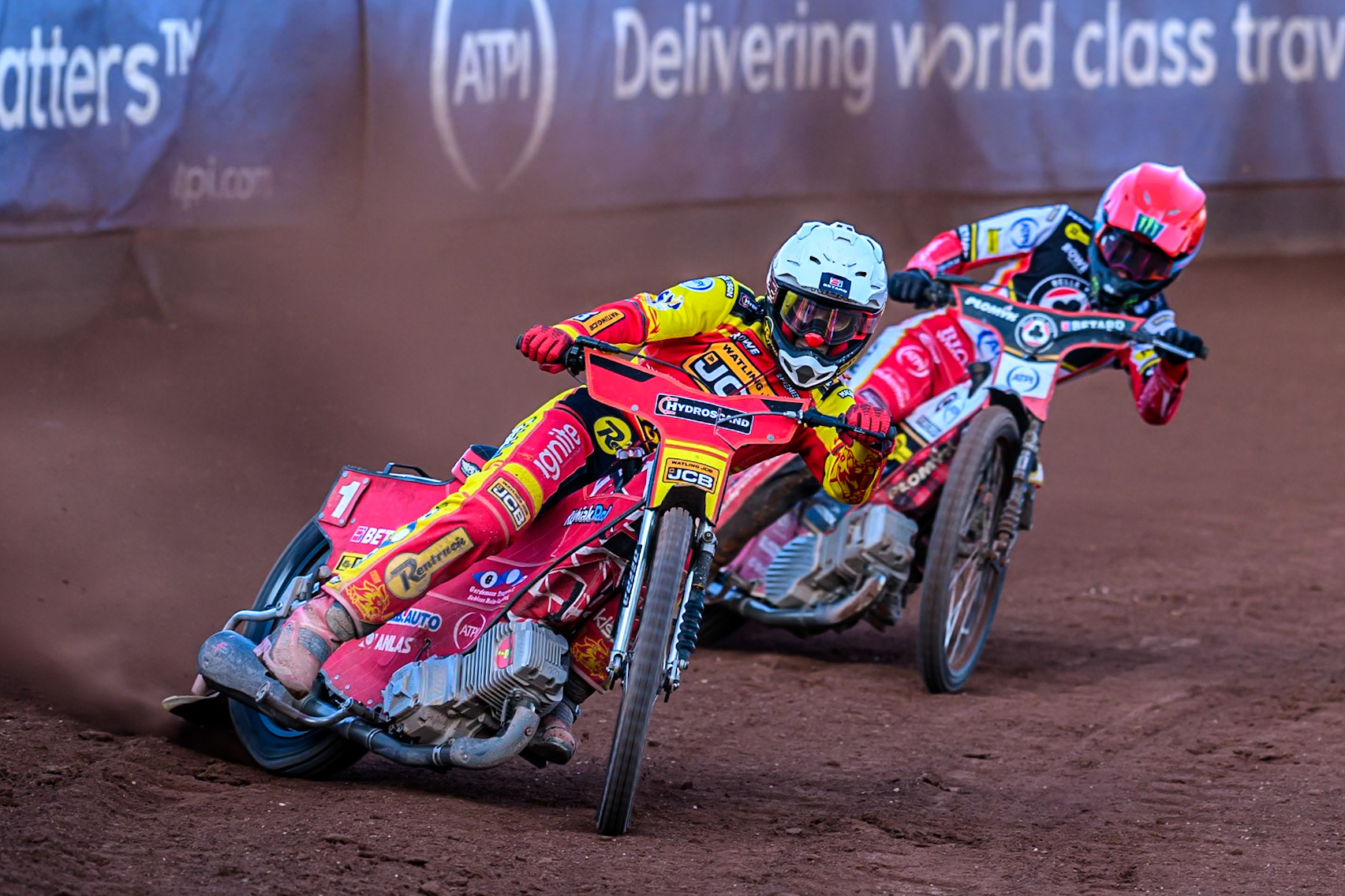 Leicester Lions' Max Fricke  in White leading Belle Vue Aces' Dan Bewley in Red during the Rowe Motor Oil Premiership match between Belle Vue Aces and Leicester Lions at the National Speedway Stadium, Manchester on Monday 14th July 2025. (Photo: Ian Charles | MI News)