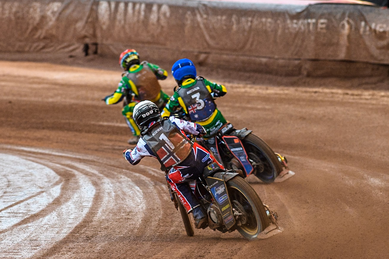 Mathias Pollestad of Norway in White chases Brady Kurtz of Australia in Blue and Jack Holder of Australia in Red during the Monster Energy FIM Speedway of Nation Semi Final 2 at the National Speedway Stadium, Manchester on Wednesday 10th July 2024. (Photo: Ian Charles | MI News)