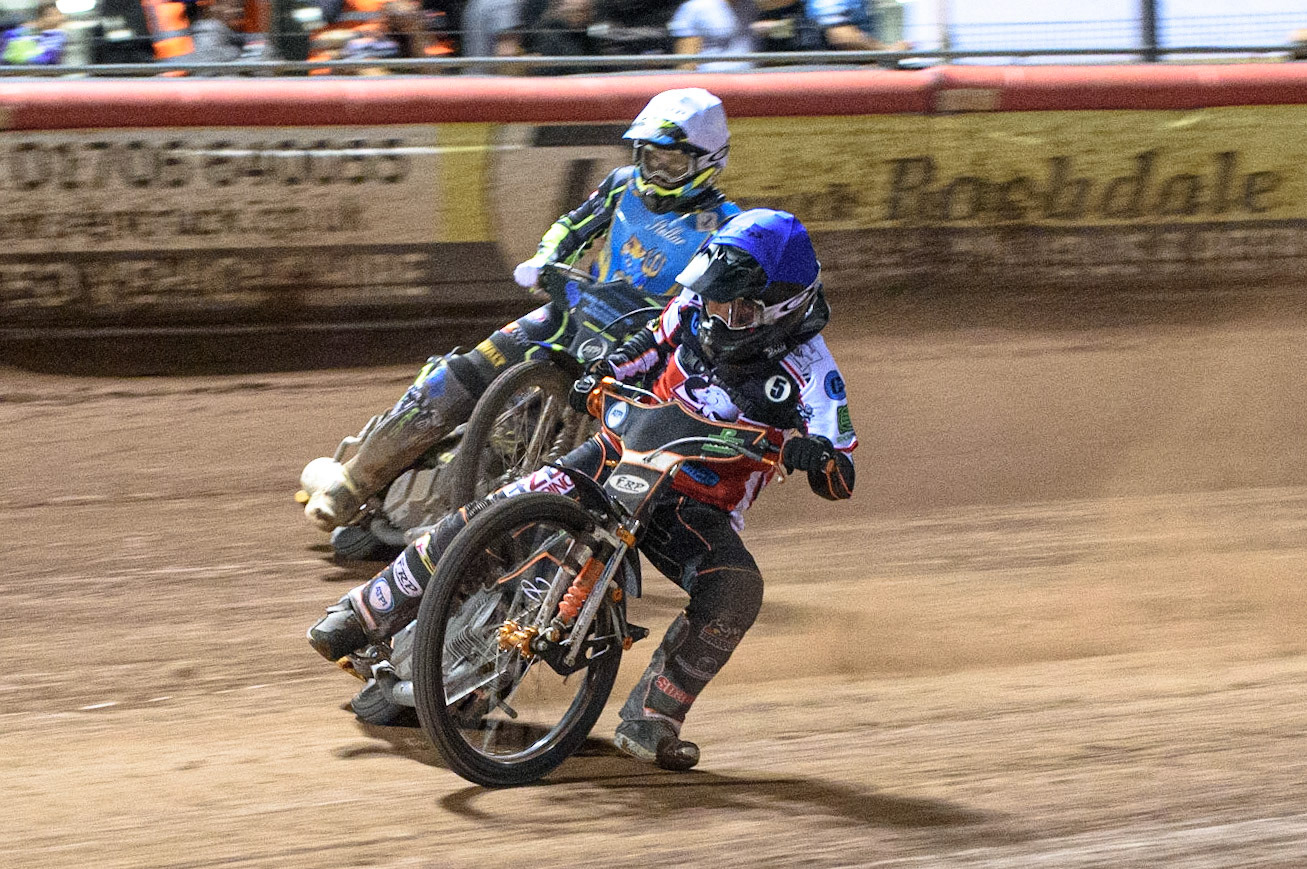 MANCHESTER, UK. AUGUST 20TH  Jack Smith (Blue) leads Kyle Bickley  (White) during the National Development League match between Belle Vue Aces and Armadale Devils at the National Speedway Stadium, Manchester on Friday 20th August 2021. (Credit: Ian Charles | MI News)