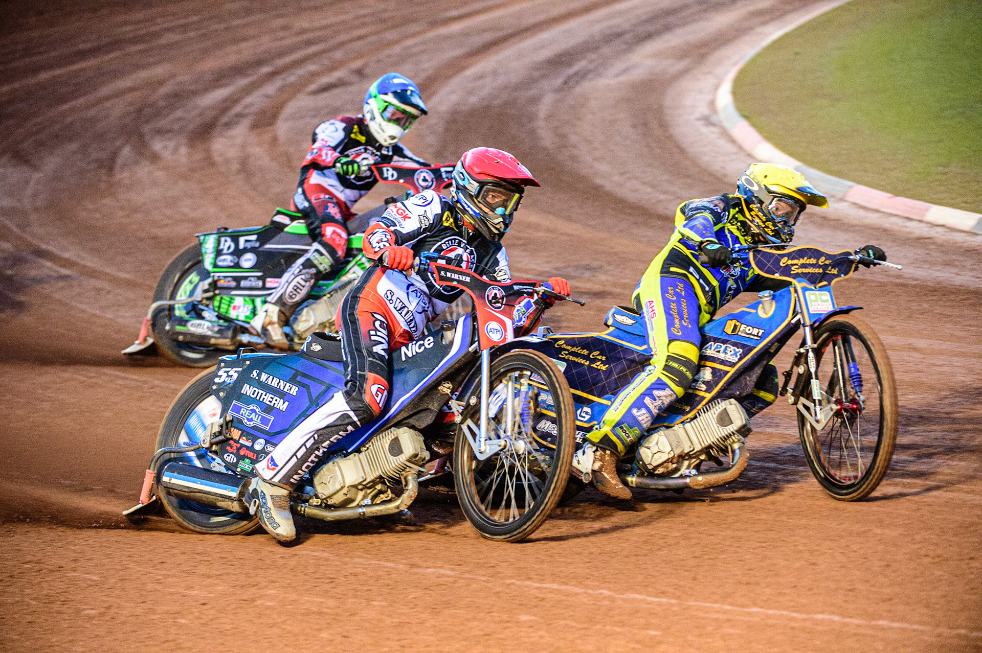 Kyle Howarth  (Yellow) inside Matej Zagar  (Red) with Charles Wright  (Blue) behind during the SGB Premiership match between Belle Vue Aces and Sheffield Tigers at the National Speedway Stadium, Manchester on Monday 5th September 2022. (Credit: Ian Charles | MI News)