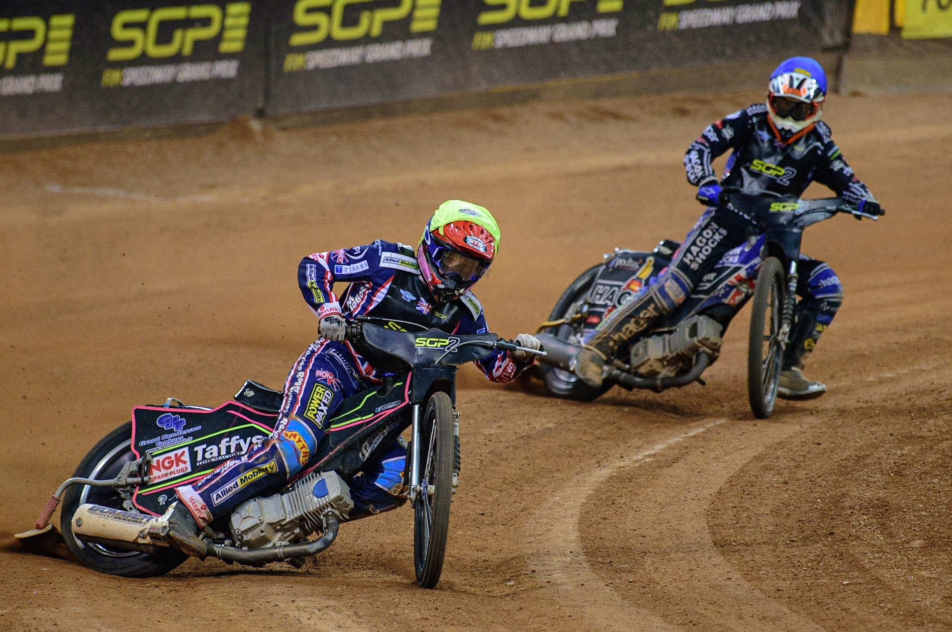 Leon Flint (Great Britain)  (Yellow) leads Jason Edwards (Great Britain) (Blue) during the FIM  Speedway Grand Prix  2 of Great Britain at the Principality Stadium, Cardiff on Sunday 14th August 2022. (Credit: Ian Charles | MI News)