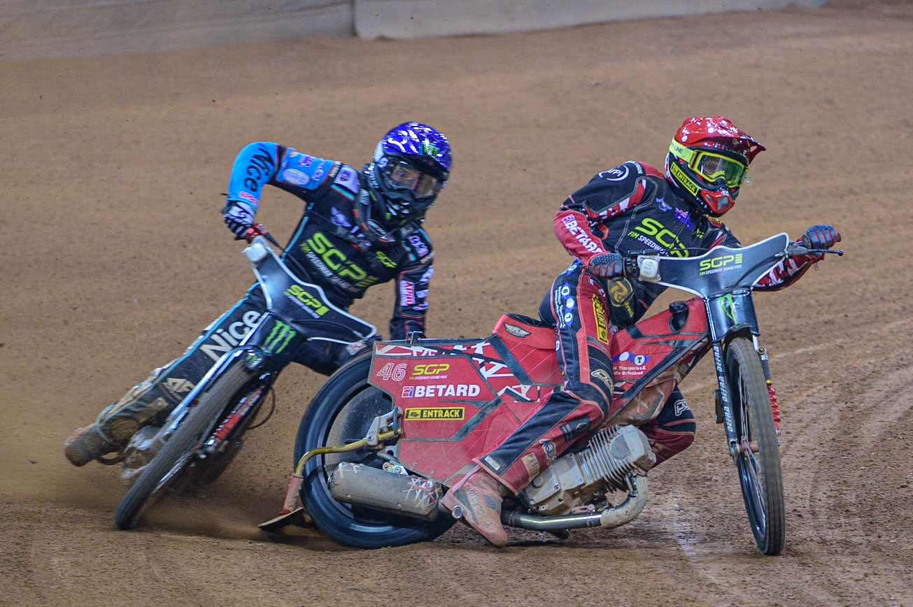Paweł Przedpelski (323) (Blue) gets in difficulty behind Max Fricke (46) (Red) during the FIM  Speedway Grand Prix of Great Britain at the Principality Stadium, Cardiff on Saturday 13th August 2022. (Credit: Ian Charles | MI News
