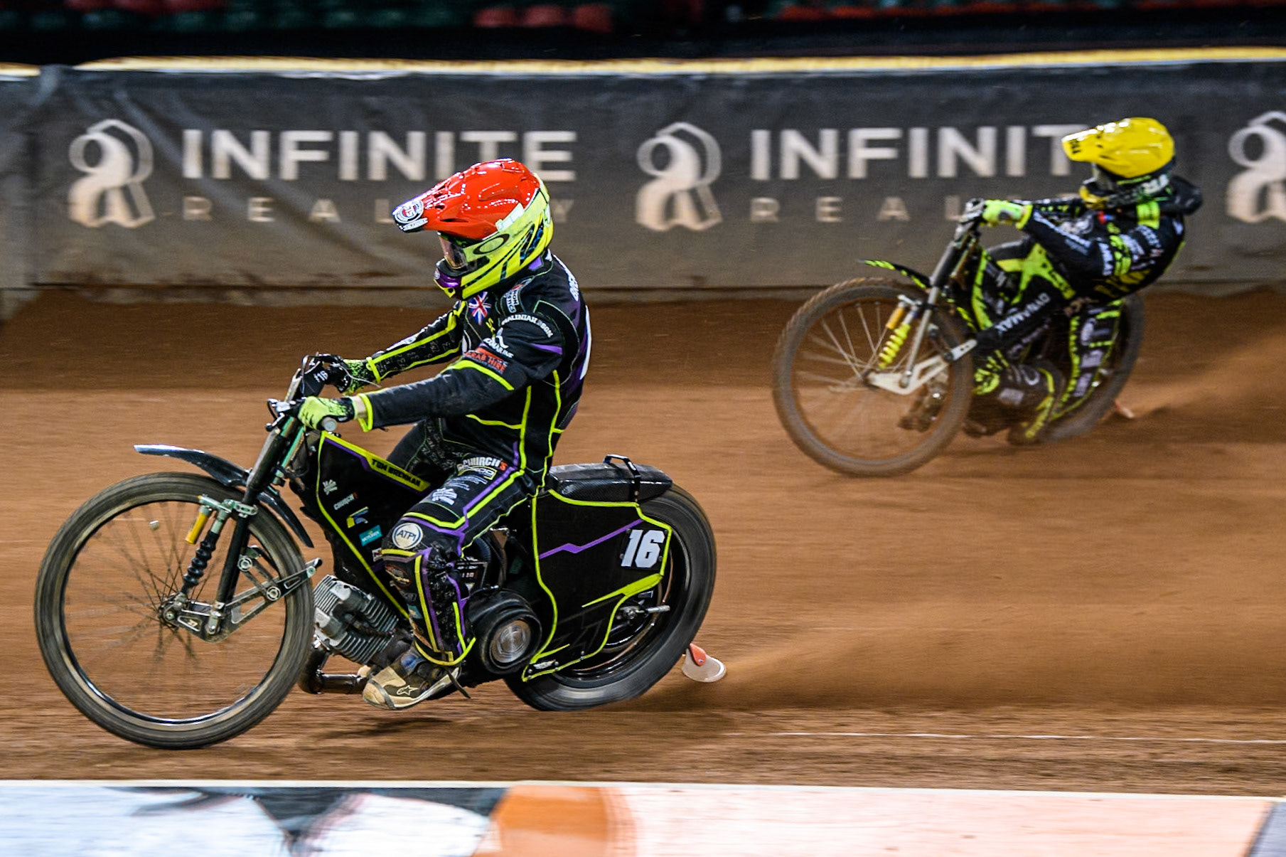 Tom Brennan (16) Wild card rider of Great Britain in Red leading Martin Vaculik (54) of Slovakia in Yellow during the FIM Speedway Grand Prix of Great Britain at The Principality Stadium, Cardiff on Saturday 17th August 2024. (Photo: Ian Charles | MI News)
