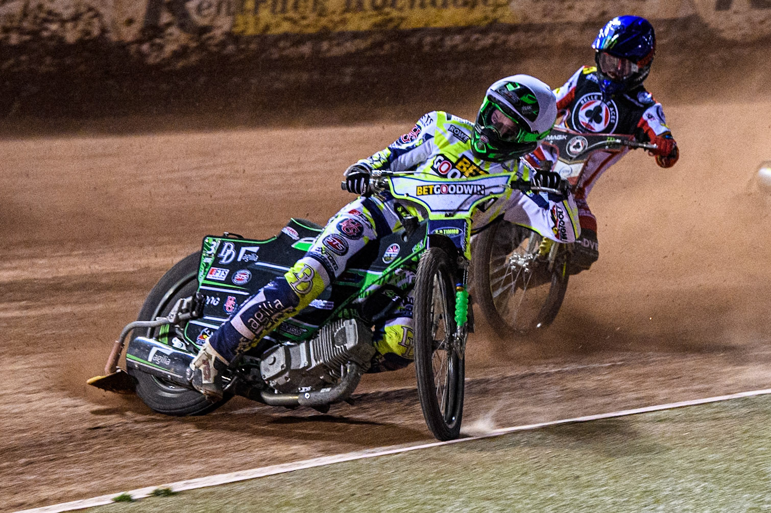 Oxford Spires' Charles Wright in White leading Belle Vue Aces' Jaimon Lidsey in Blue during the Rowe Motor Oil Premiership match between Belle Vue Aces and Oxford Spires at the National Speedway Stadium, Manchester on Monday 14th April 2025. (Photo: Ian Charles | MI News)