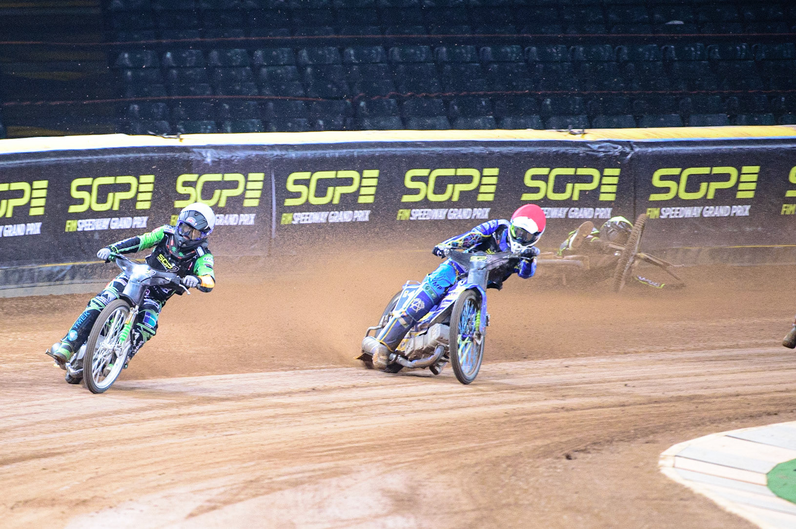 Benjamin Basso (Denmark)  (White) leads Petr Chlupac (Czech Republic) (Red) as Gustav Grahn (Sweden)  falls during the FIM  Speedway Grand Prix  2 of Great Britain at the Principality Stadium, Cardiff on Sunday 14th August 2022. (Credit: Ian Charles | MI News)