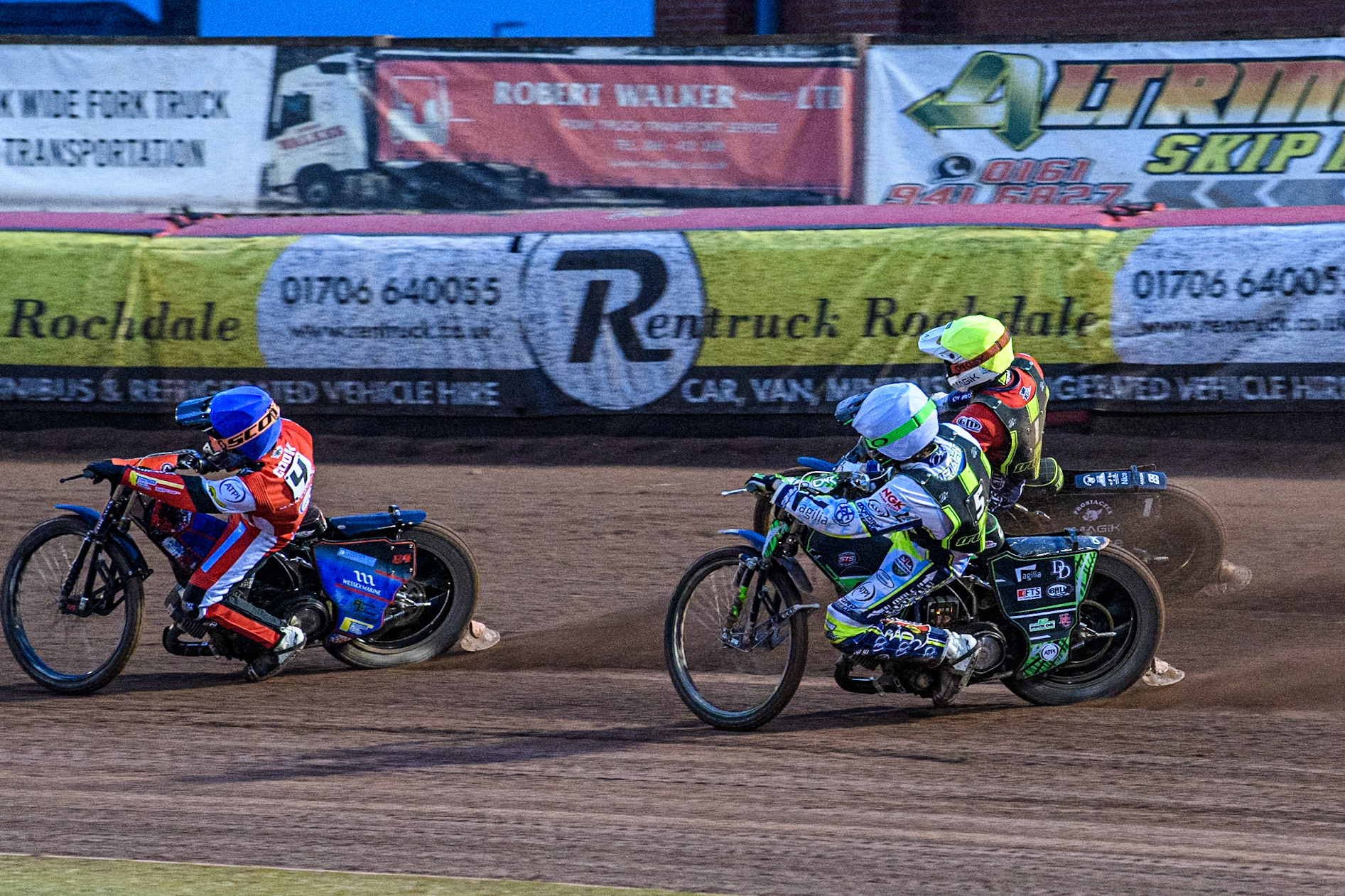 Belle Vue Aces' Ben Cook in Blue leading Ipswich Witches' Guest Charles Wright in White and Ipswich Witches' Emil Sayfutdinov in Yellow during the Rowe Motor Oil Premiership match between Belle Vue Aces and Ipswich Witches at the National Speedway Stadium, Manchester on Monday 22nd April 2024. (Photo: Ian Charles | MI News)