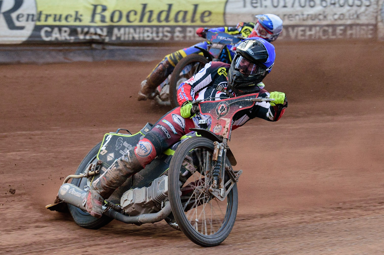 MANCHESTER, UK. JUL 5TH  Tom Brennan  (Blue) leads Tobiasz Musielak  (White)  during the SGB Premiership match between Belle Vue Aces and Sheffield Tigers at the National Speedway Stadium, Manchester on Tuesday 5th July 2022. (Credit: Ian Charles | MI News)