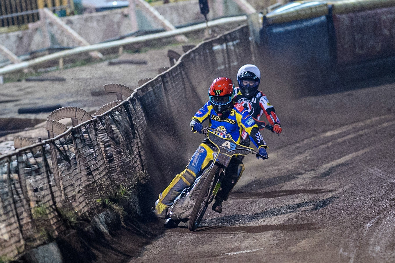 Sheffield Tigers' Chris Holder  in Red hits the dirt berm to lead Belle Vue Aces' Brady Kurtz  in White during the Rowe Motor Oil Premiership Play Off Semi Final 2nd leg between Sheffield Tigers and Belle Vue Aces at Owlerton Stadium, Sheffield on Thursday 19th September 2024. (Photo: Ian Charles | MI News)